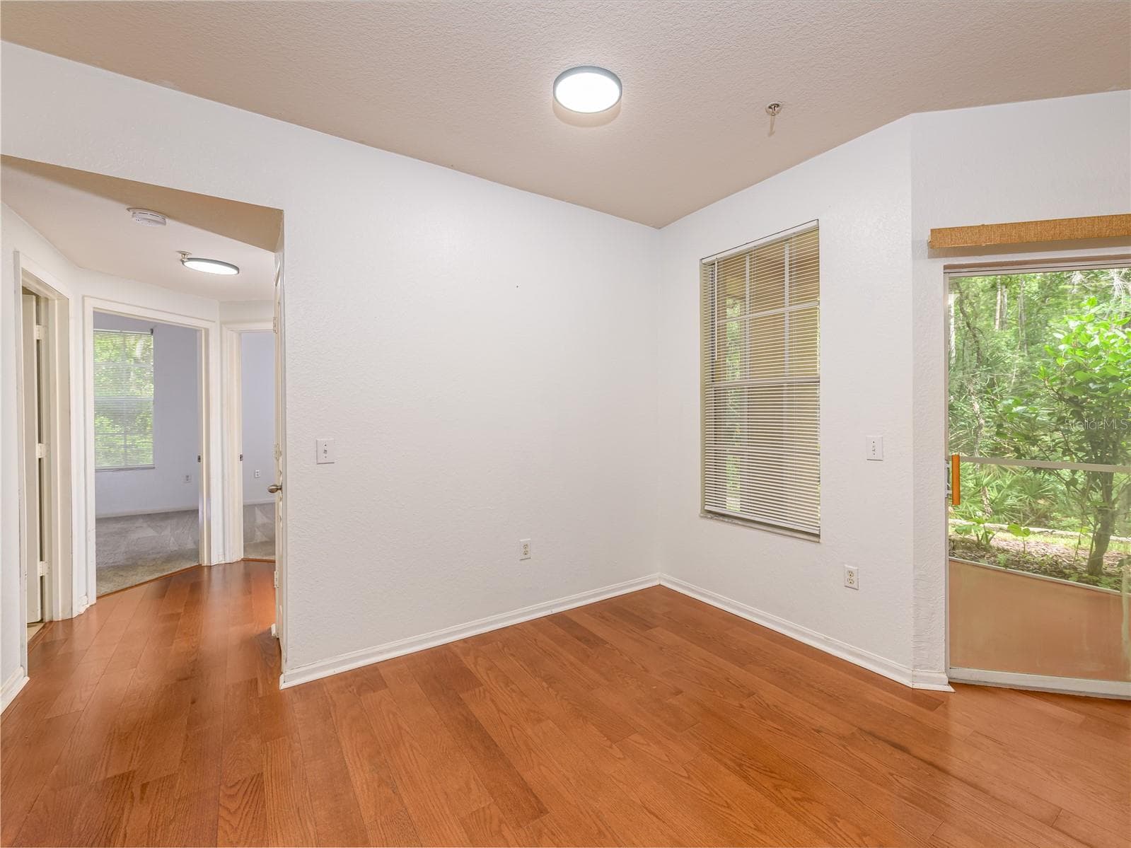 hallway off living area leading to guest bedrooms - 5125 PALM SPRINGS BLVD #7108, TAMPA