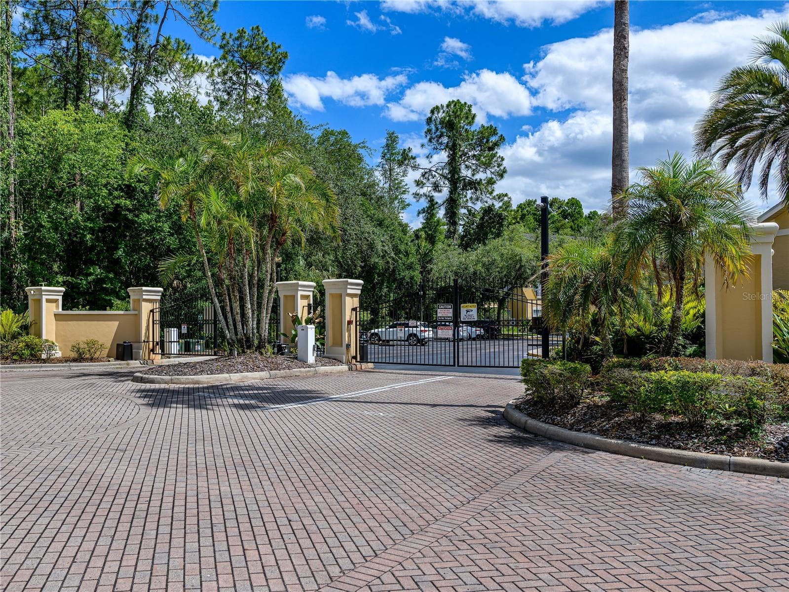 Gated entrance to Oxford Place at Tampa Palms - 5125 PALM SPRINGS BLVD #7108, TAMPA