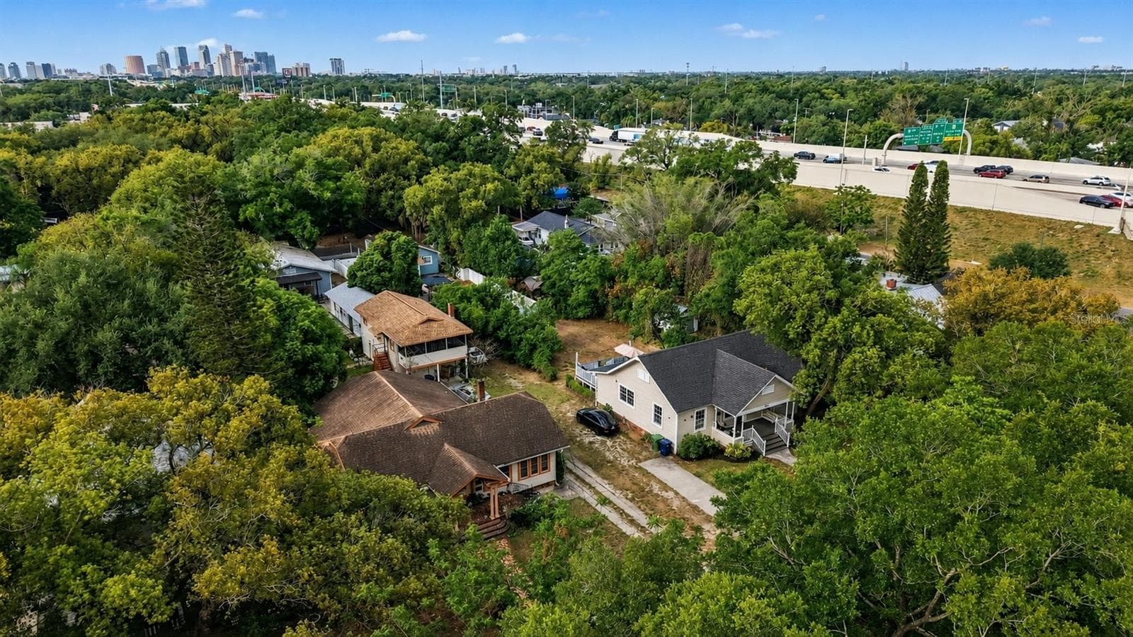 Aerial view highlighting property location and surroundings. - 805 E CHELSEA ST, TAMPA