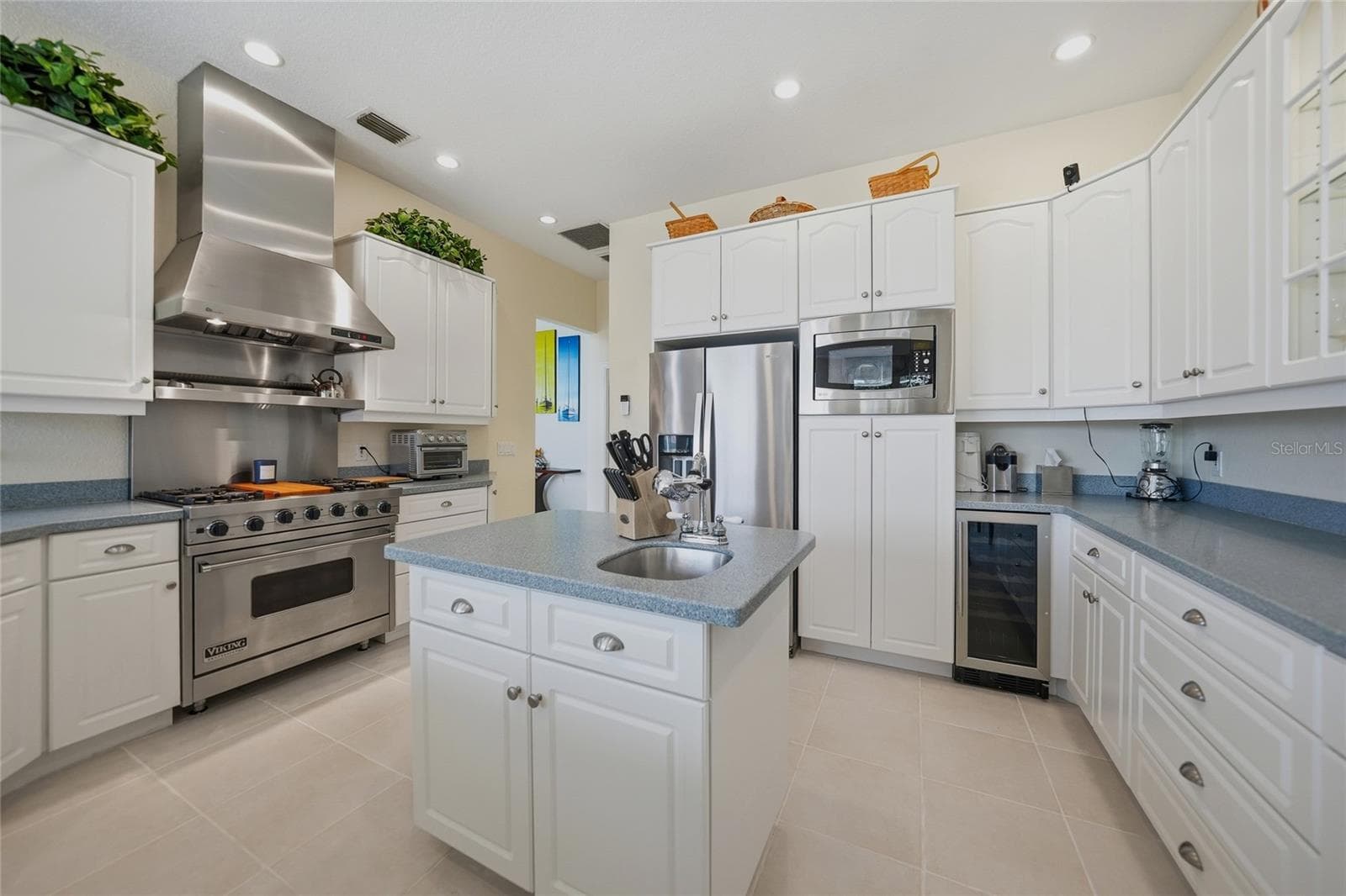 Kitchen with Gas Viking Stove and Vent Hood - 436 VALLETTA CT, PUNTA GORDA