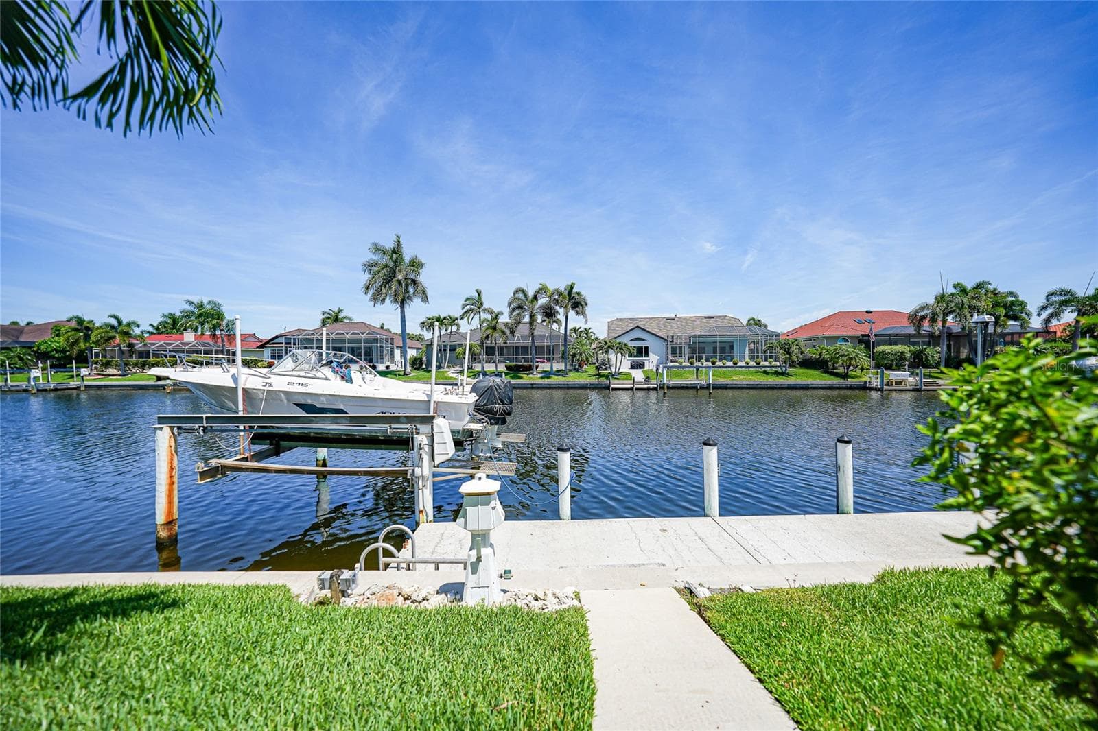 95 Ft Seawall and 45 Ft Concrete Dock with 12,000# Boat Lift - 436 VALLETTA CT, PUNTA GORDA