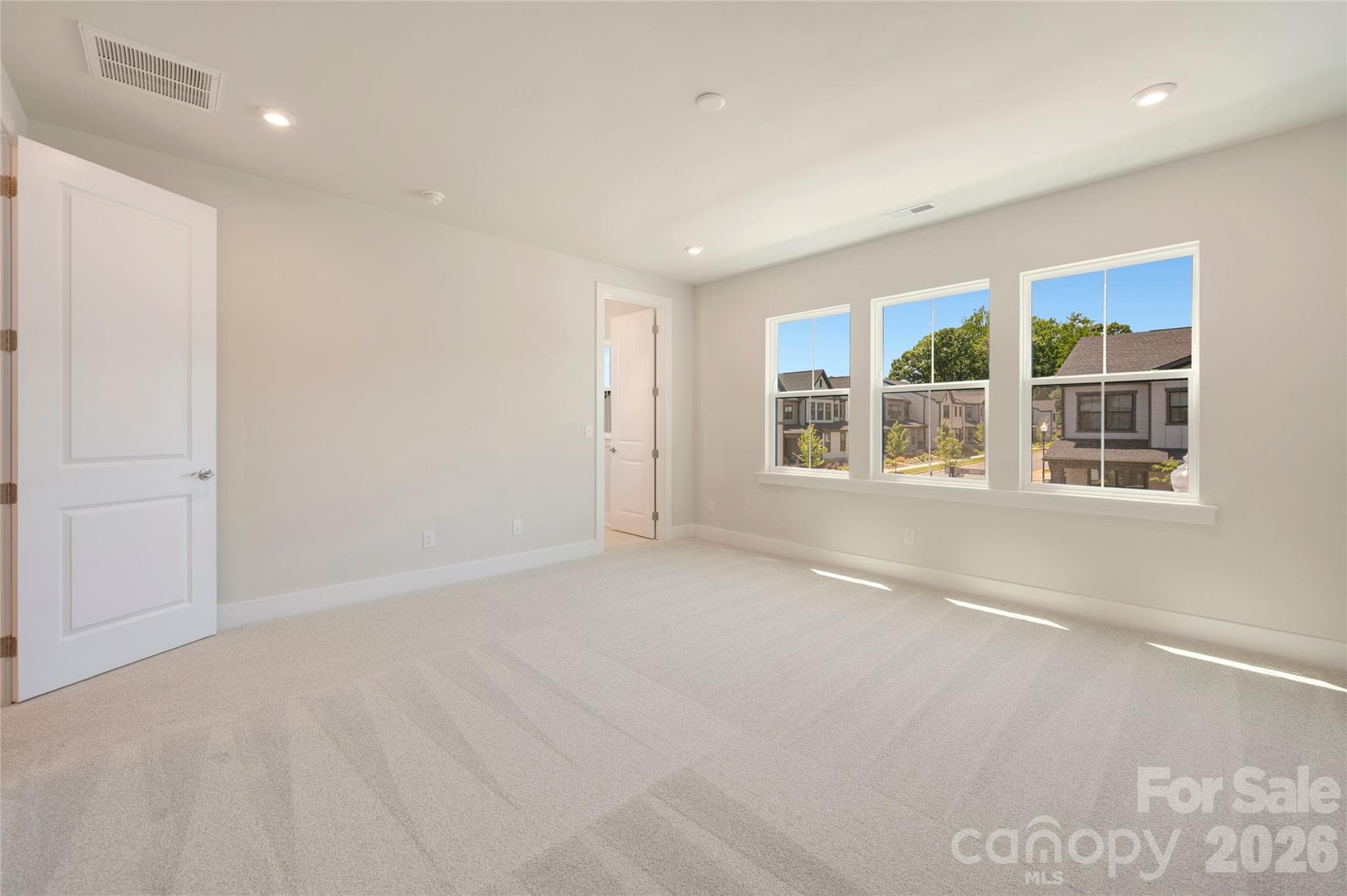Light filled primary bedroom - 316 Ardmore Drive, Belmont