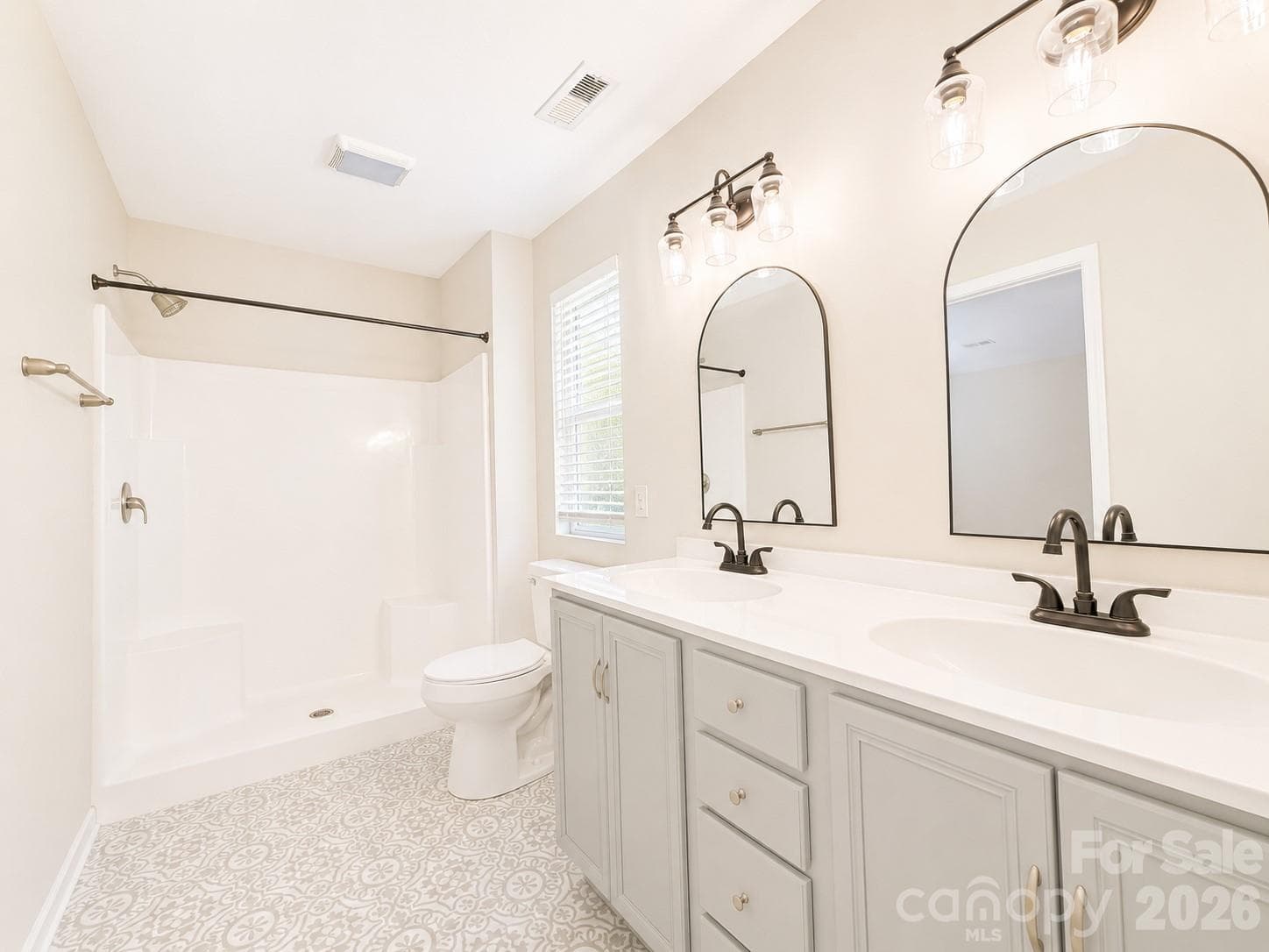 Primary Bath Updated with Walk-in Shower, Dual Vanity, Tile Floors & Large Walk-in Closet - Mooresville