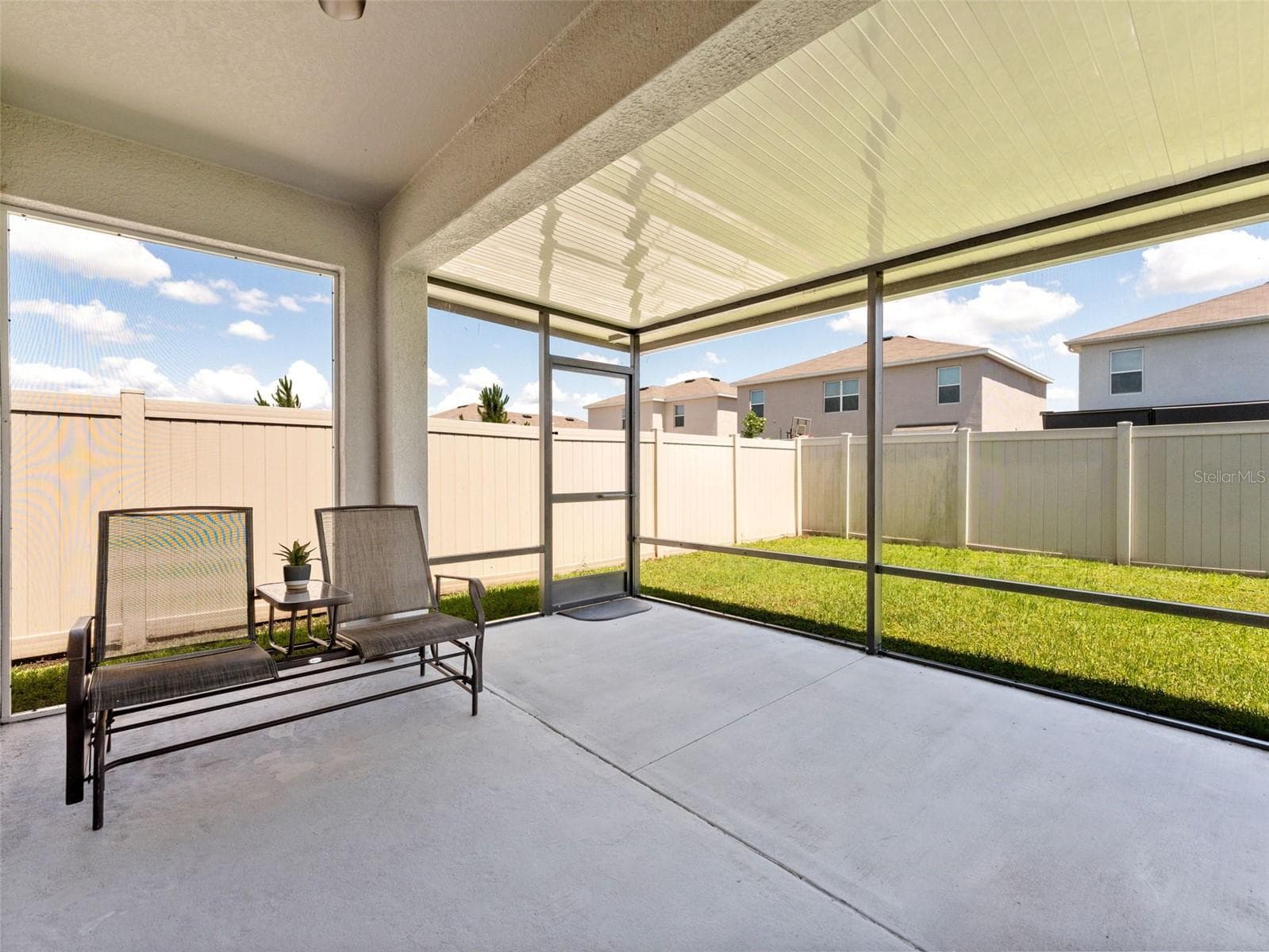 Extended covered, screened in patio - 5782 HOLLINGWORTH TRL, WESLEY CHAPEL