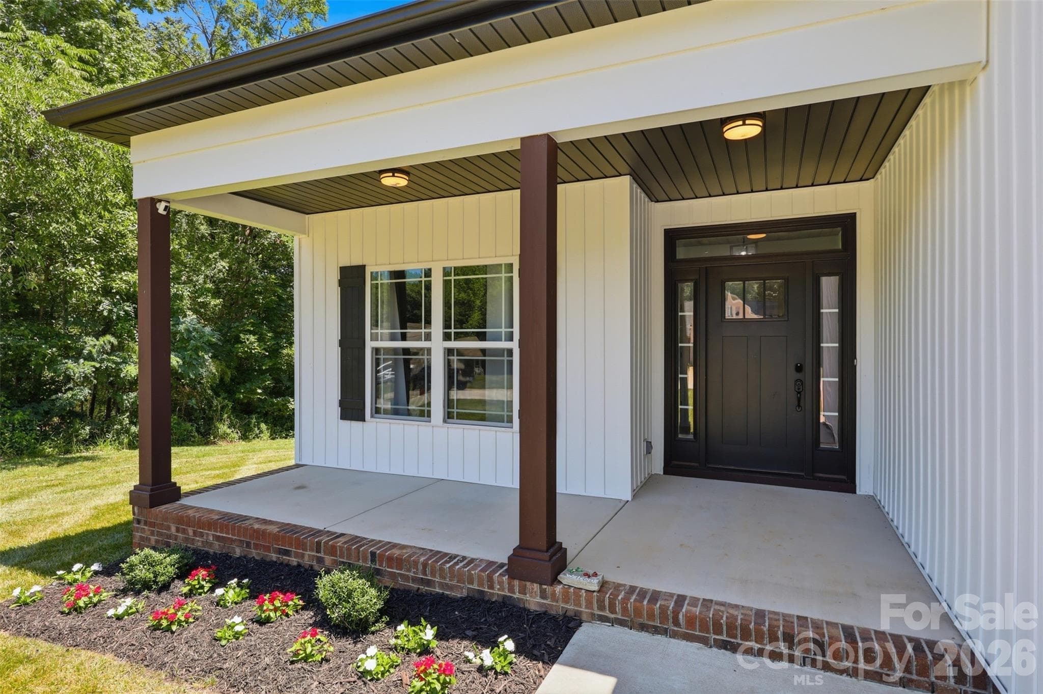 Covered front porch to relax and take in the serene outdoors - Rock Hill