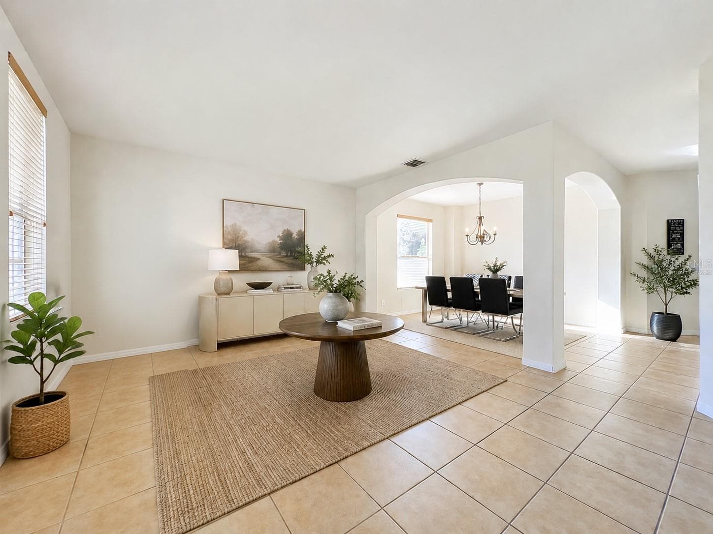 Virtually Staged Foyer & Formal Dining Room - 12912 CLOVERDALE LN, CLERMONT