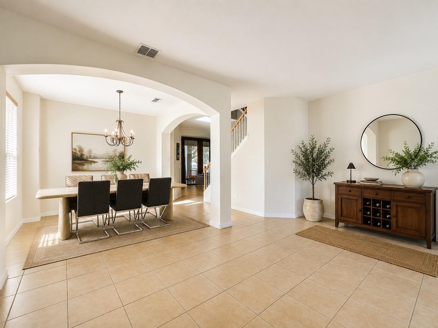 Virtually Staged Foyer & Formal Dining Room - 12912 CLOVERDALE LN, CLERMONT