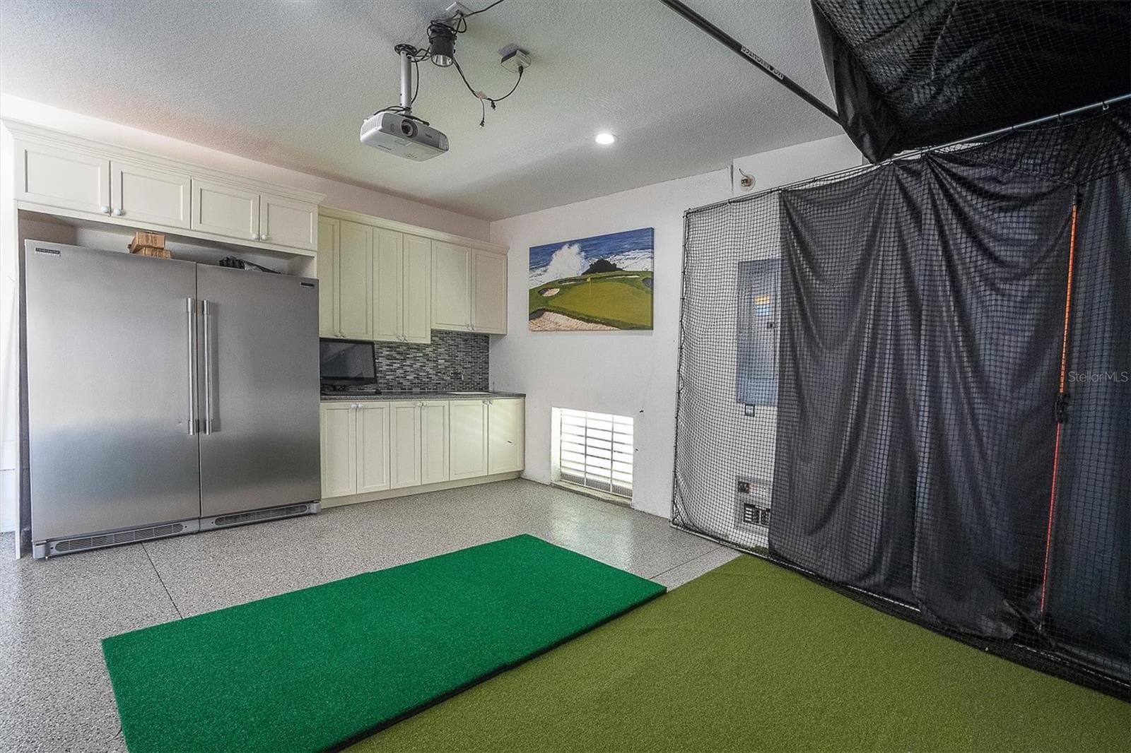 Garage w/ golf simulator - 811 BIRDIE WAY, APOLLO BEACH