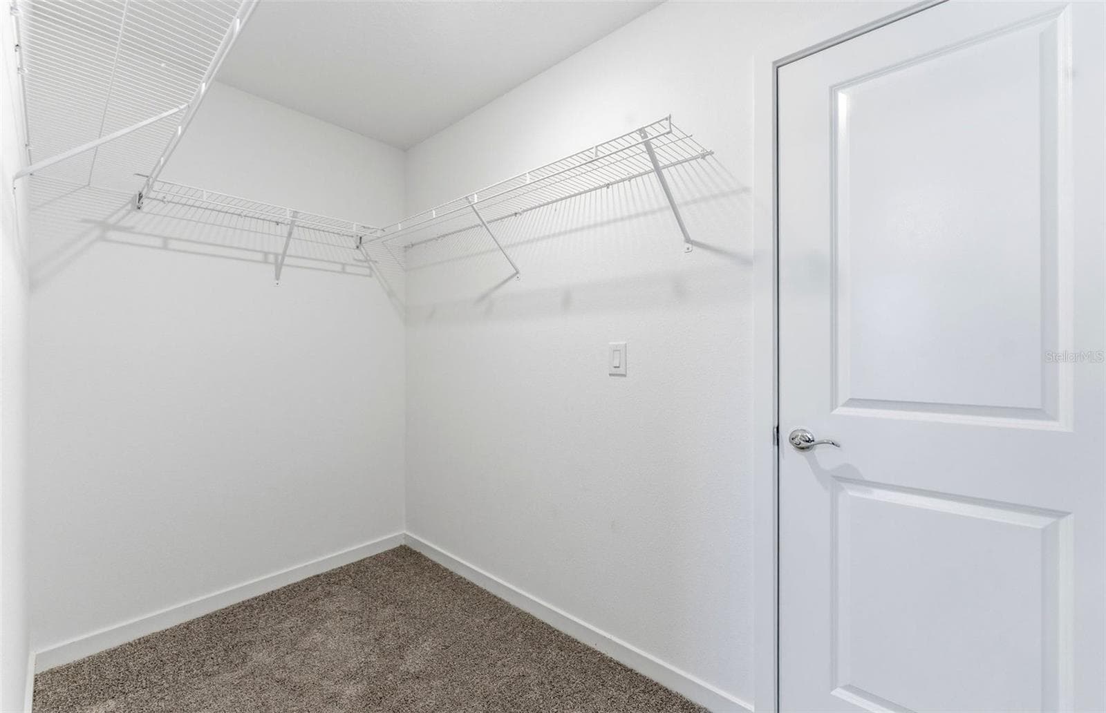 Owner's Walk-in Closet - 33426 BARNEBROOK DR, WESLEY CHAPEL