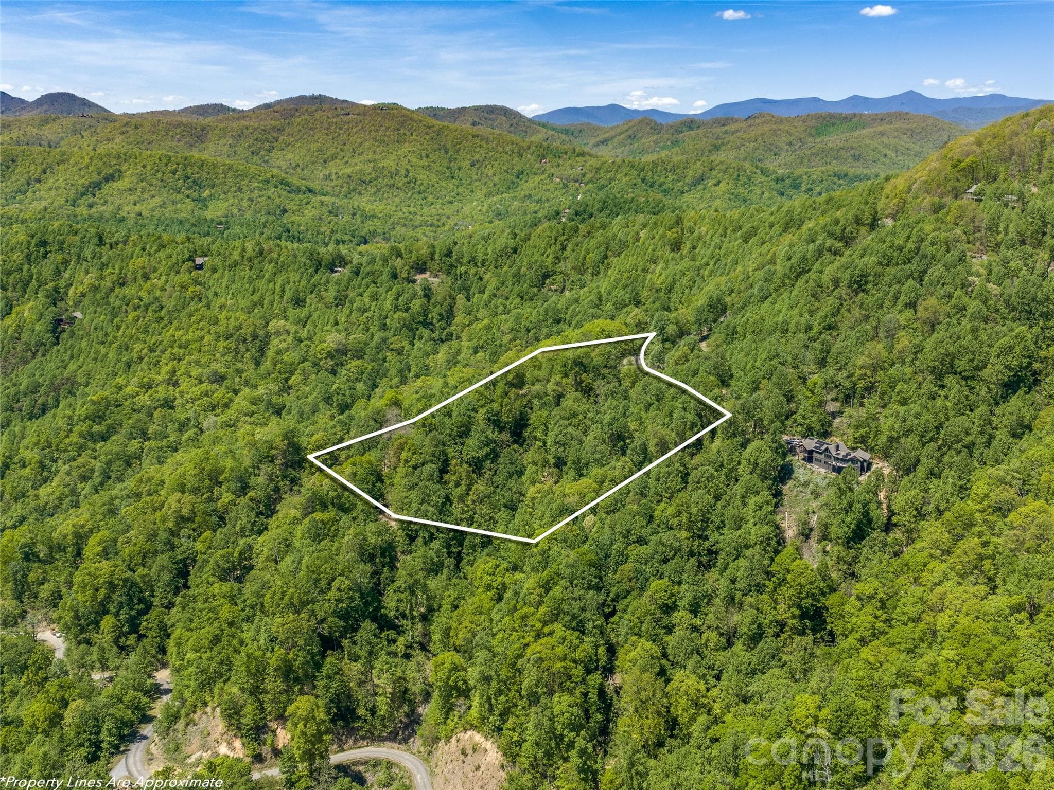 Rare 4.22-acre homesite with breathtaking year-round mountain views and exceptional privacy. - Black Mountain