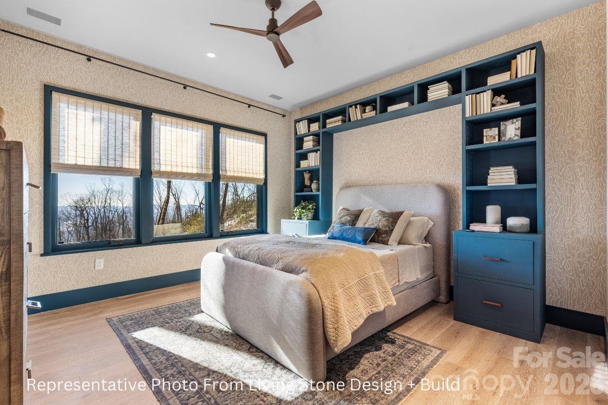 Bedroom. Representative photo from Living Stone Design + Build showing the craftsmanship, quality of construction and finish level. Final design, finishes, and details may vary. - Black Mountain