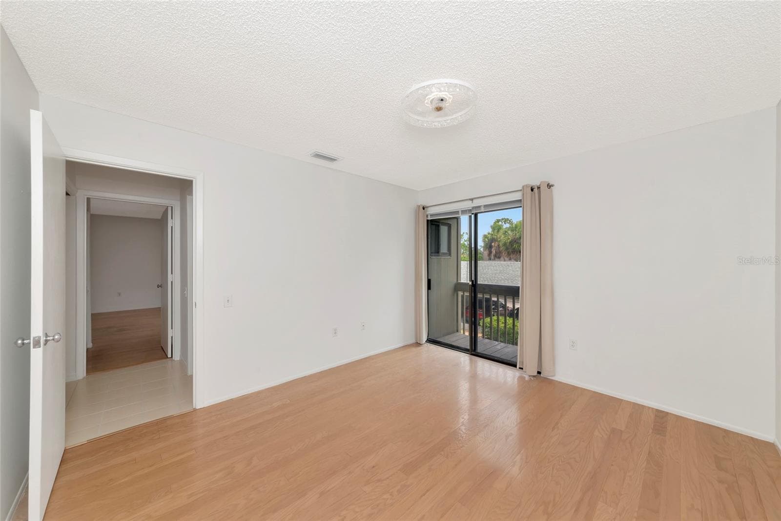 Second Bedroom with Balcony - 116 WOODLAND PL #116, OSPREY