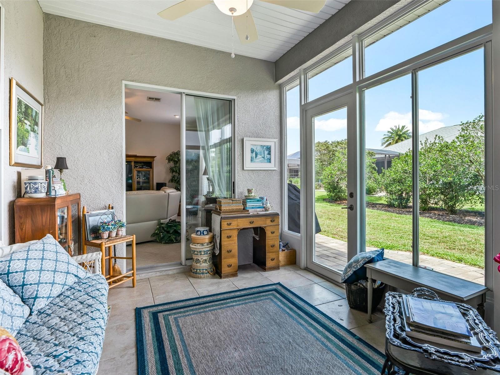 13 x10 Glass Enclosed Lanai w/access to Living area & Back Patio - 12421 SE 174TH LOOP, SUMMERFIELD