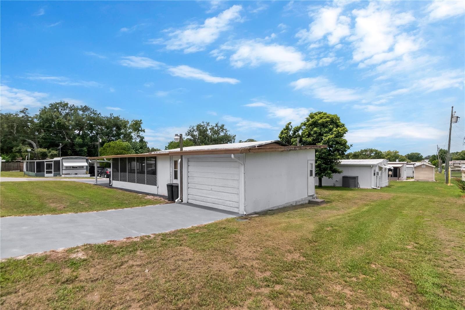 Manufactured Home at 39219 OLA AVE, ZEPHYRHILLS, photo 2 of 36