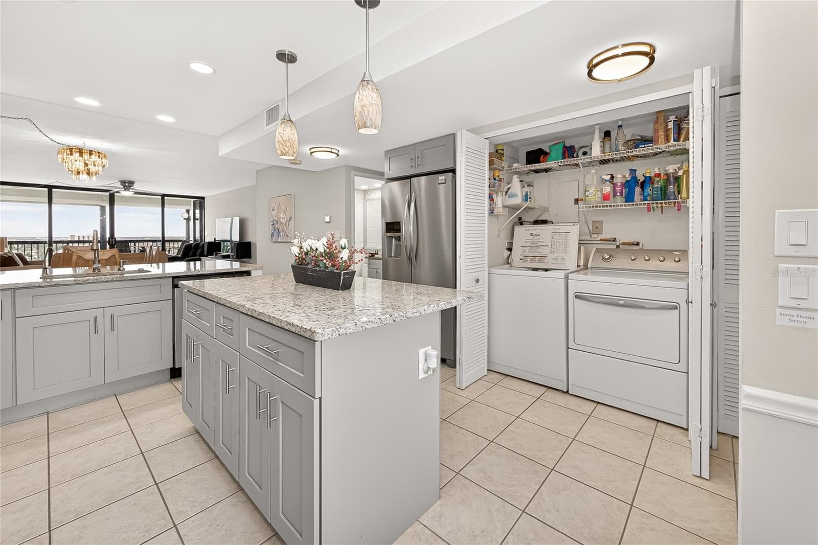 The Sellers extended the laundry closet to accommodate a regular size washer/dryer. - 9425 BLIND PASS RD #1103, ST PETE BEACH