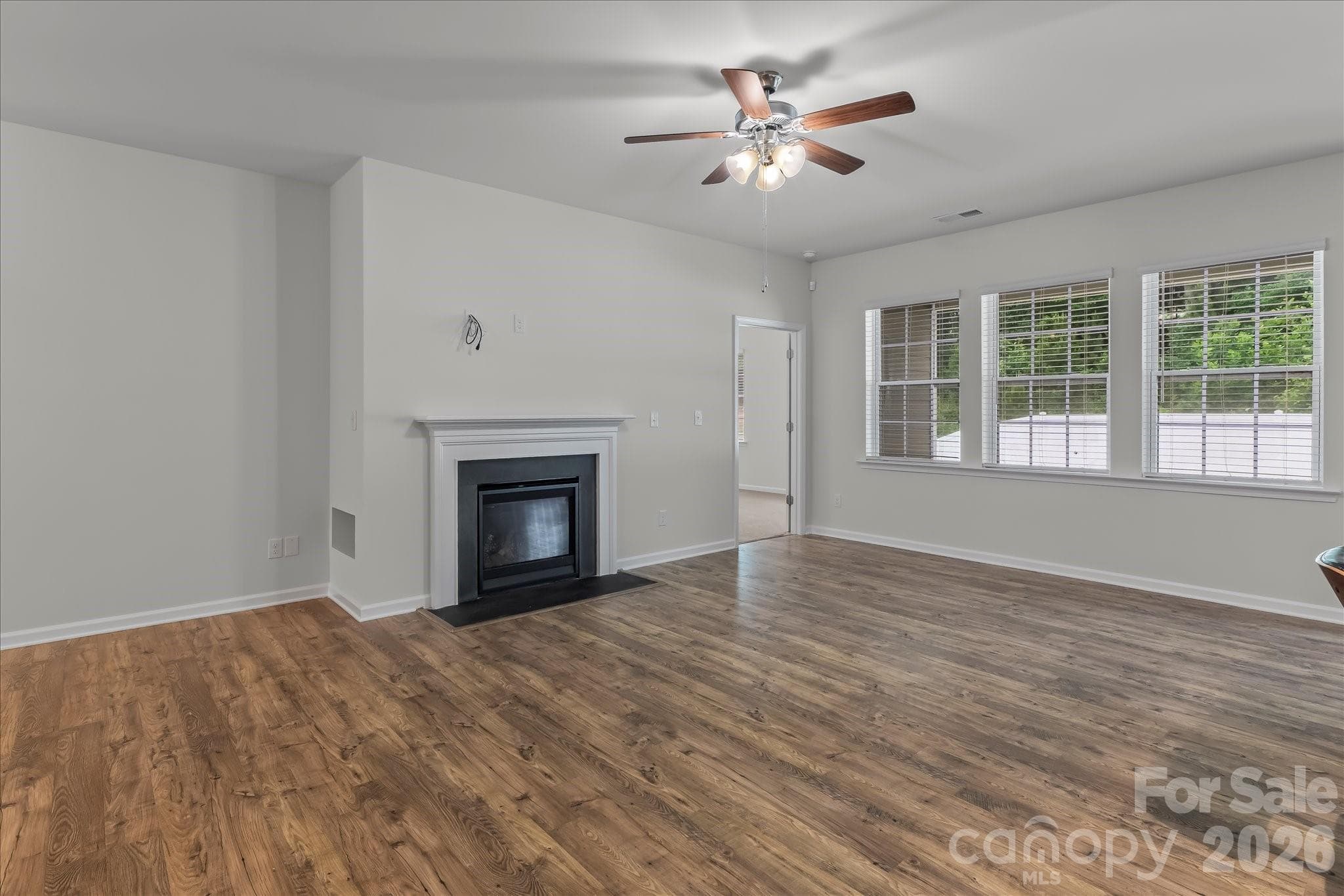 Family room with views of the private back yard - Mooresville