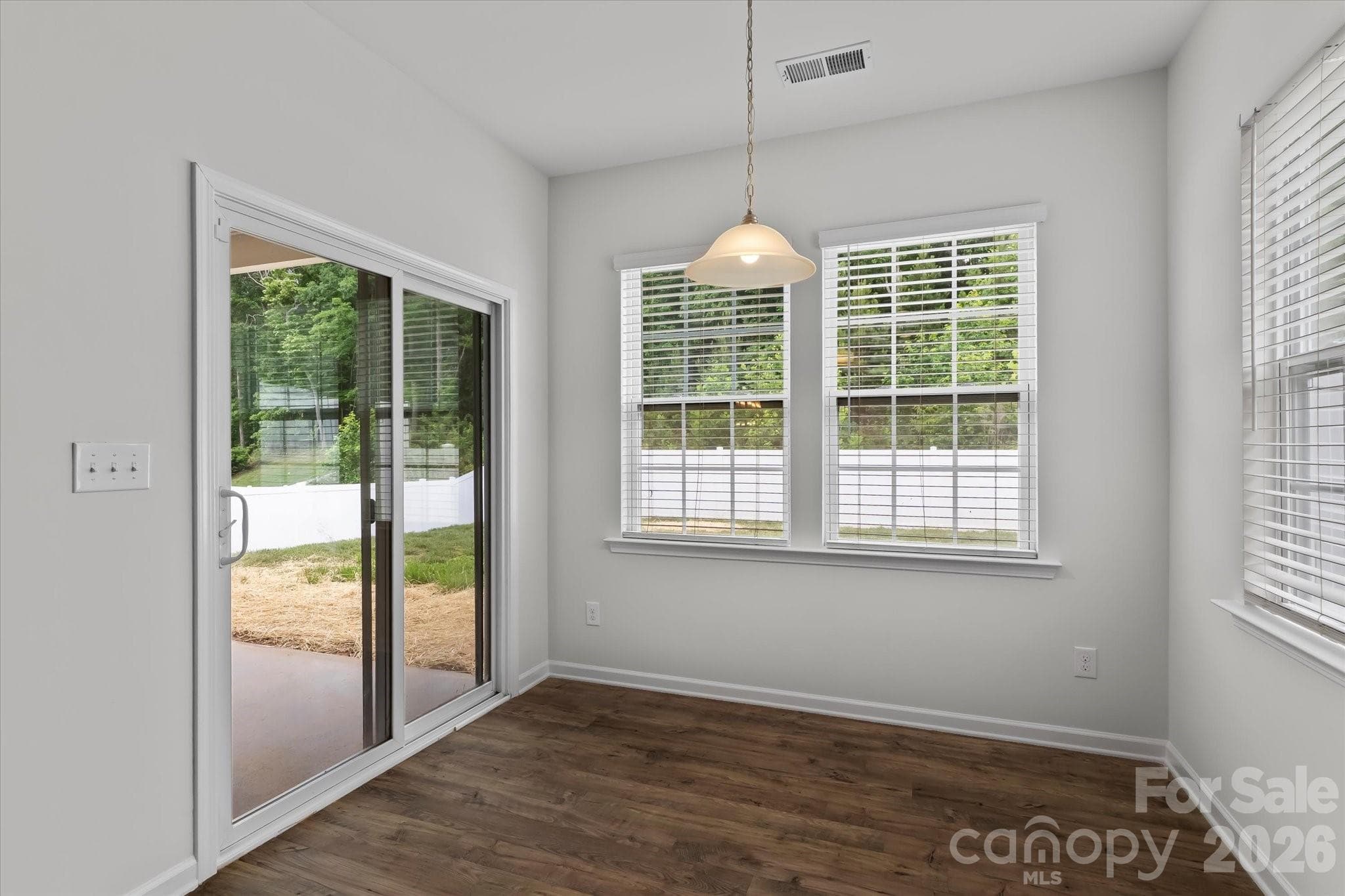 Breakfast area with access to the covered back porch - Mooresville