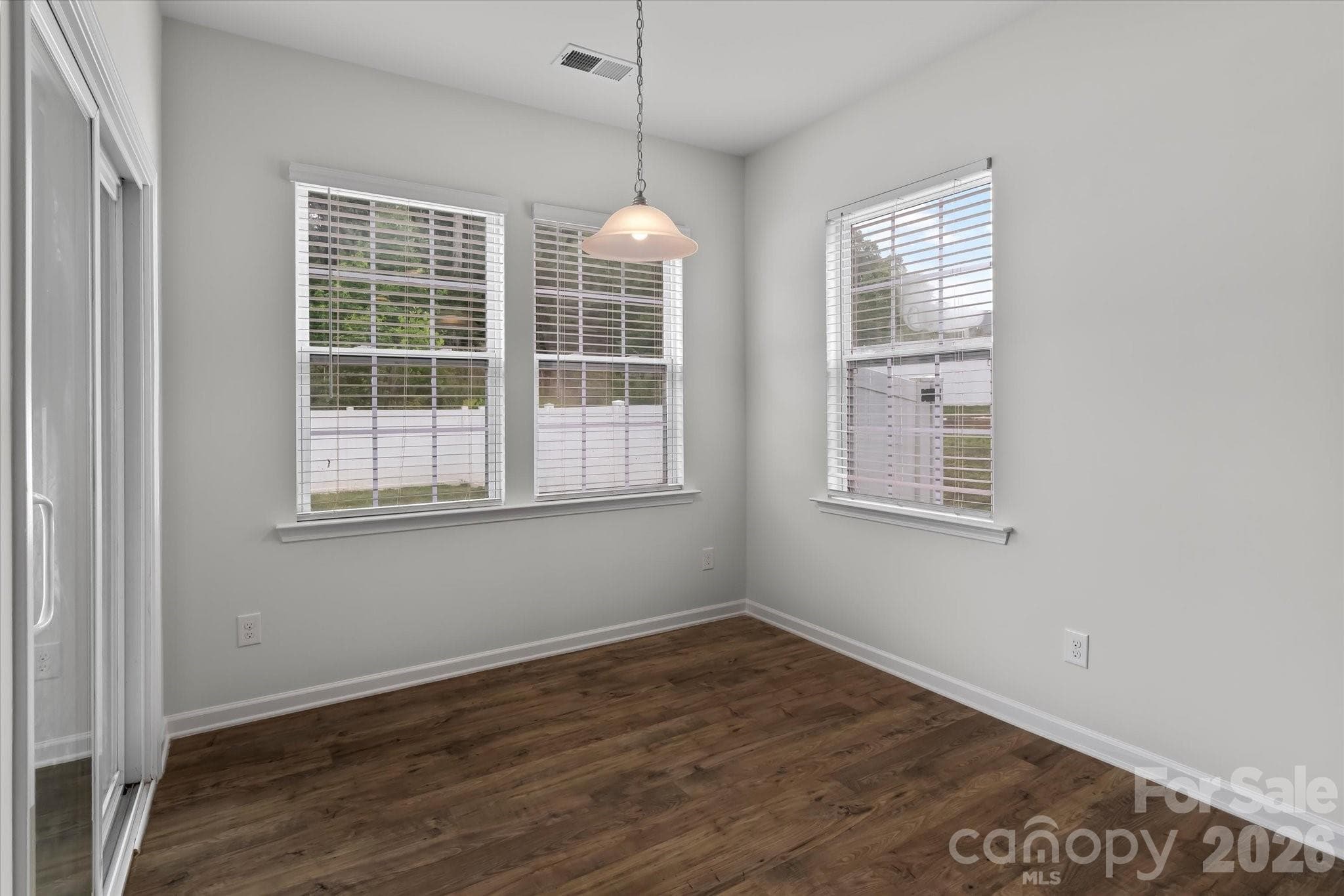 Breakfast area with access to the covered back porch - Mooresville