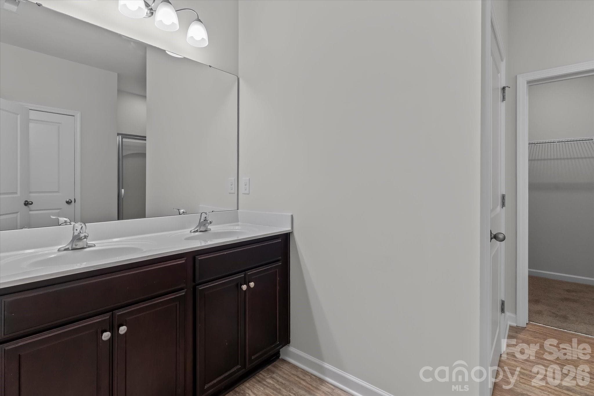 Primary bathroom with dual vanities - Mooresville