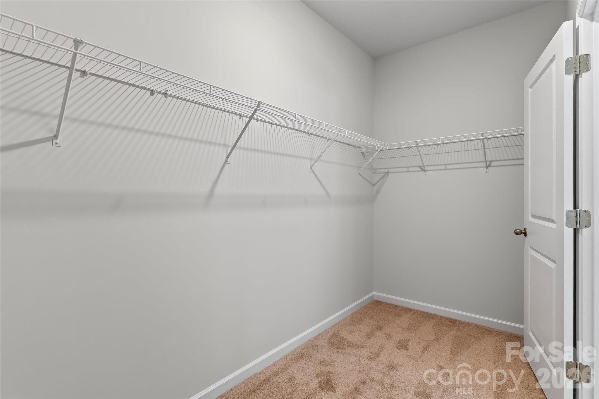 Primary bedroom walk-in closet - Mooresville