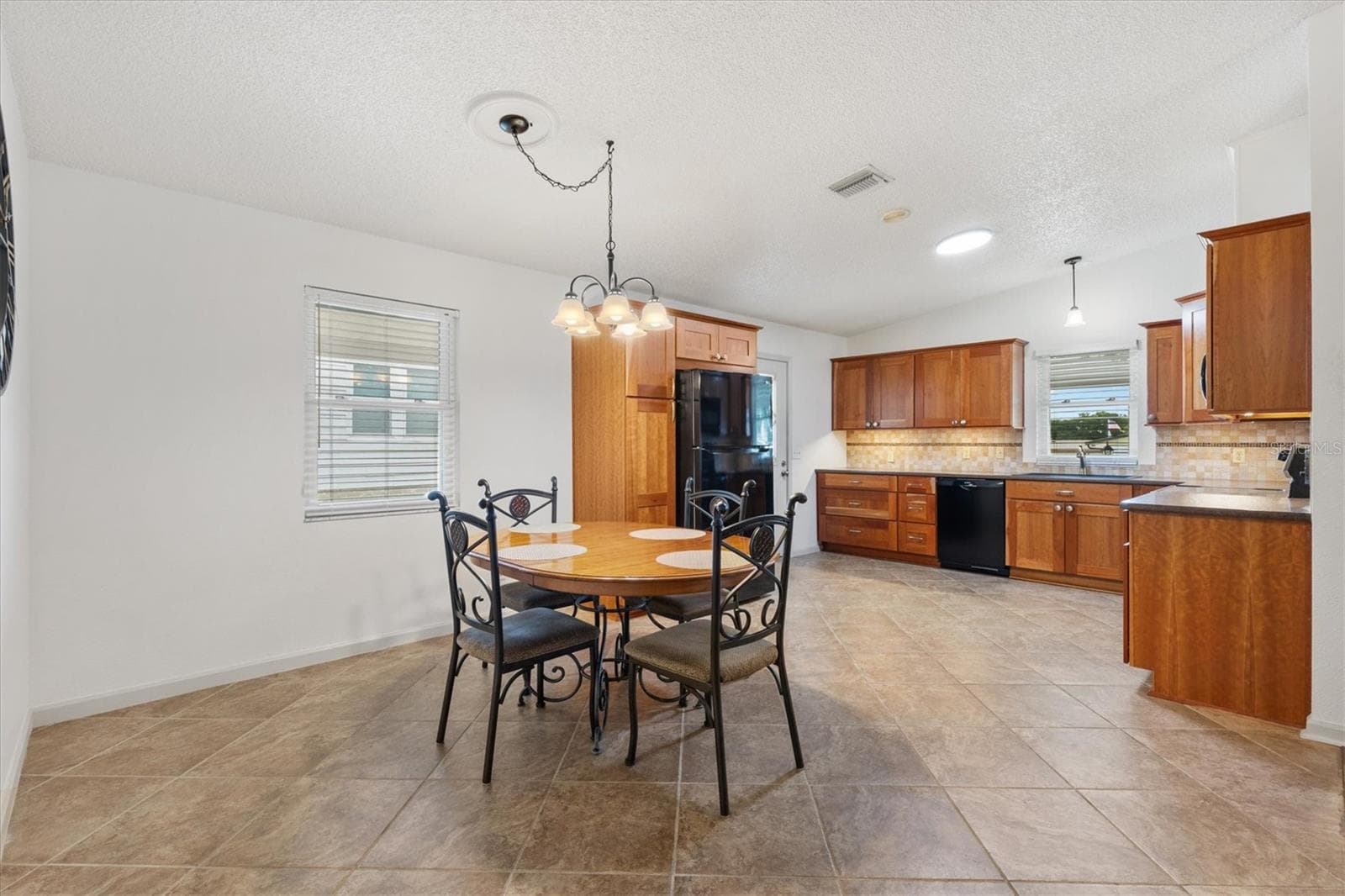 Dining Room and Kitchen - 1534 HILLCREST DR, LADY LAKE