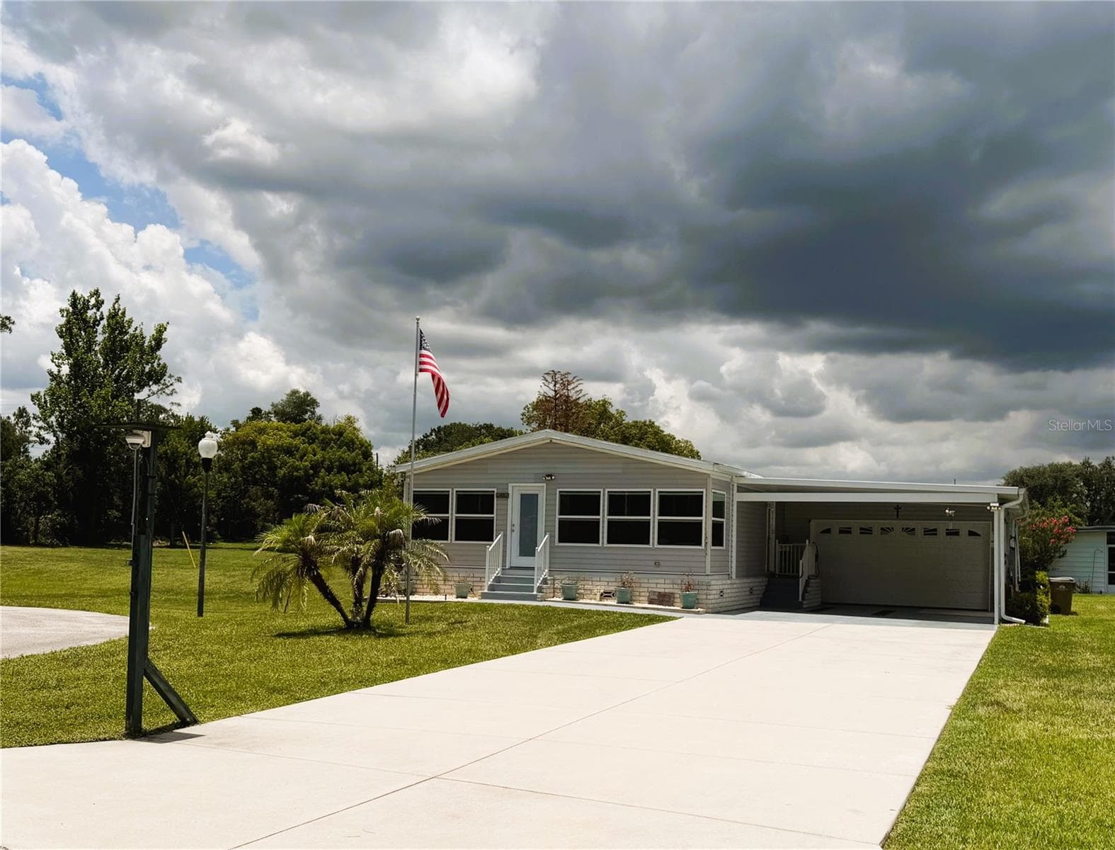 Manufactured Home at 165 SAGO PALM DR, LEESBURG, photo 3 of 63