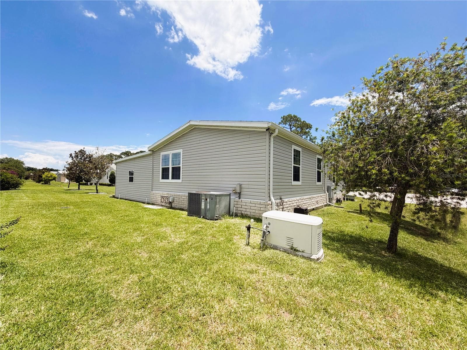 Manufactured Home at 165 SAGO PALM DR, LEESBURG, photo 15 of 63