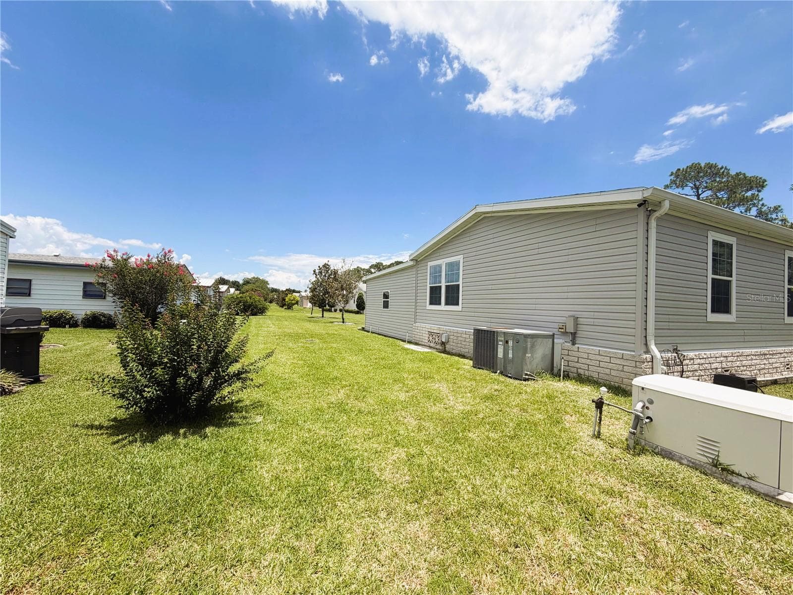 Manufactured Home at 165 SAGO PALM DR, LEESBURG, photo 17 of 63