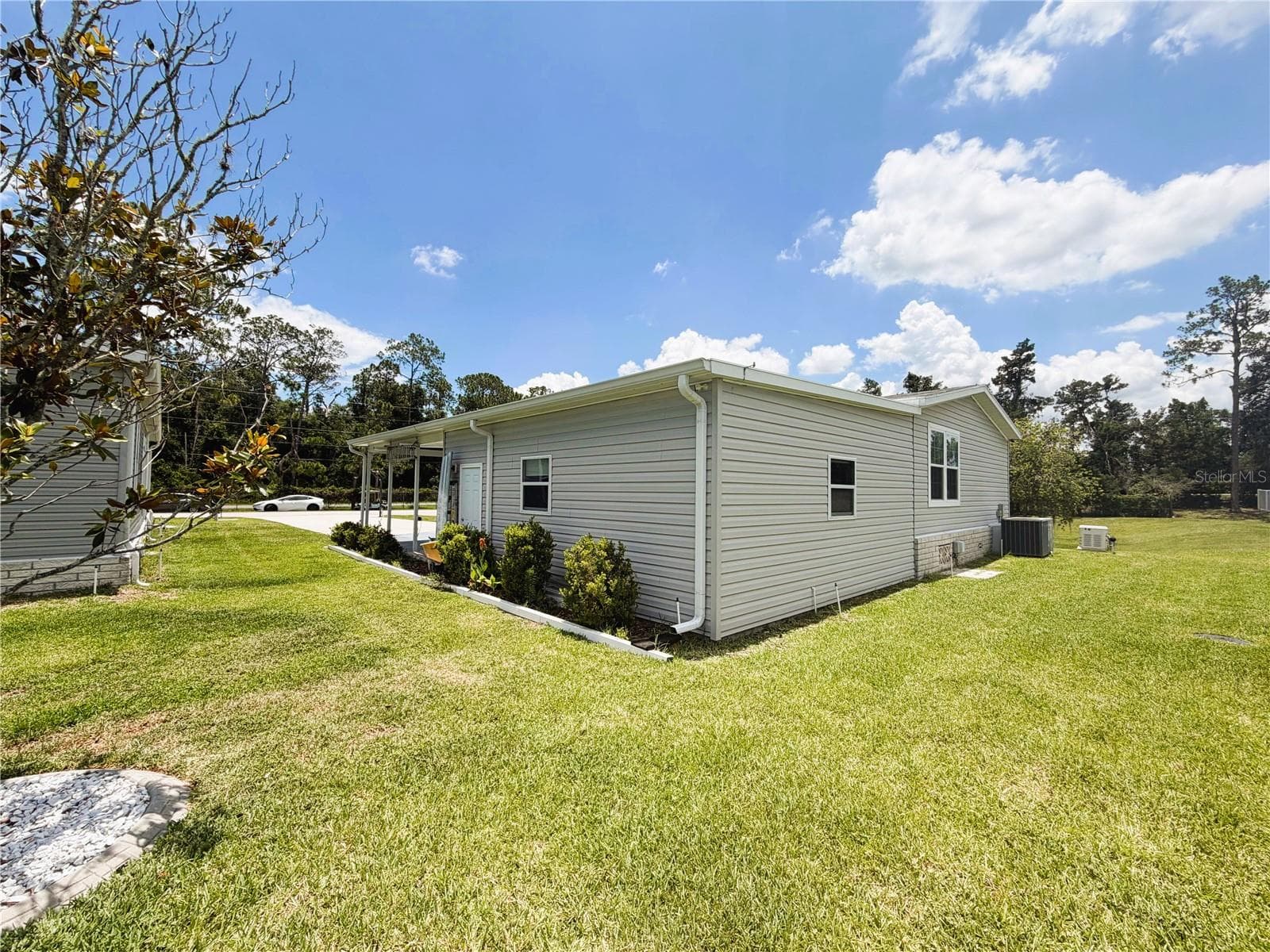 Manufactured Home at 165 SAGO PALM DR, LEESBURG, photo 19 of 63