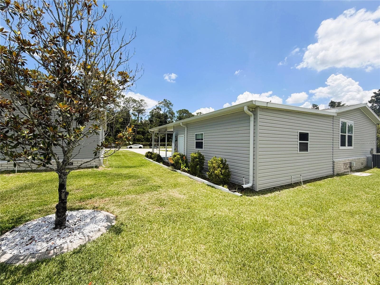Manufactured Home at 165 SAGO PALM DR, LEESBURG, photo 20 of 63