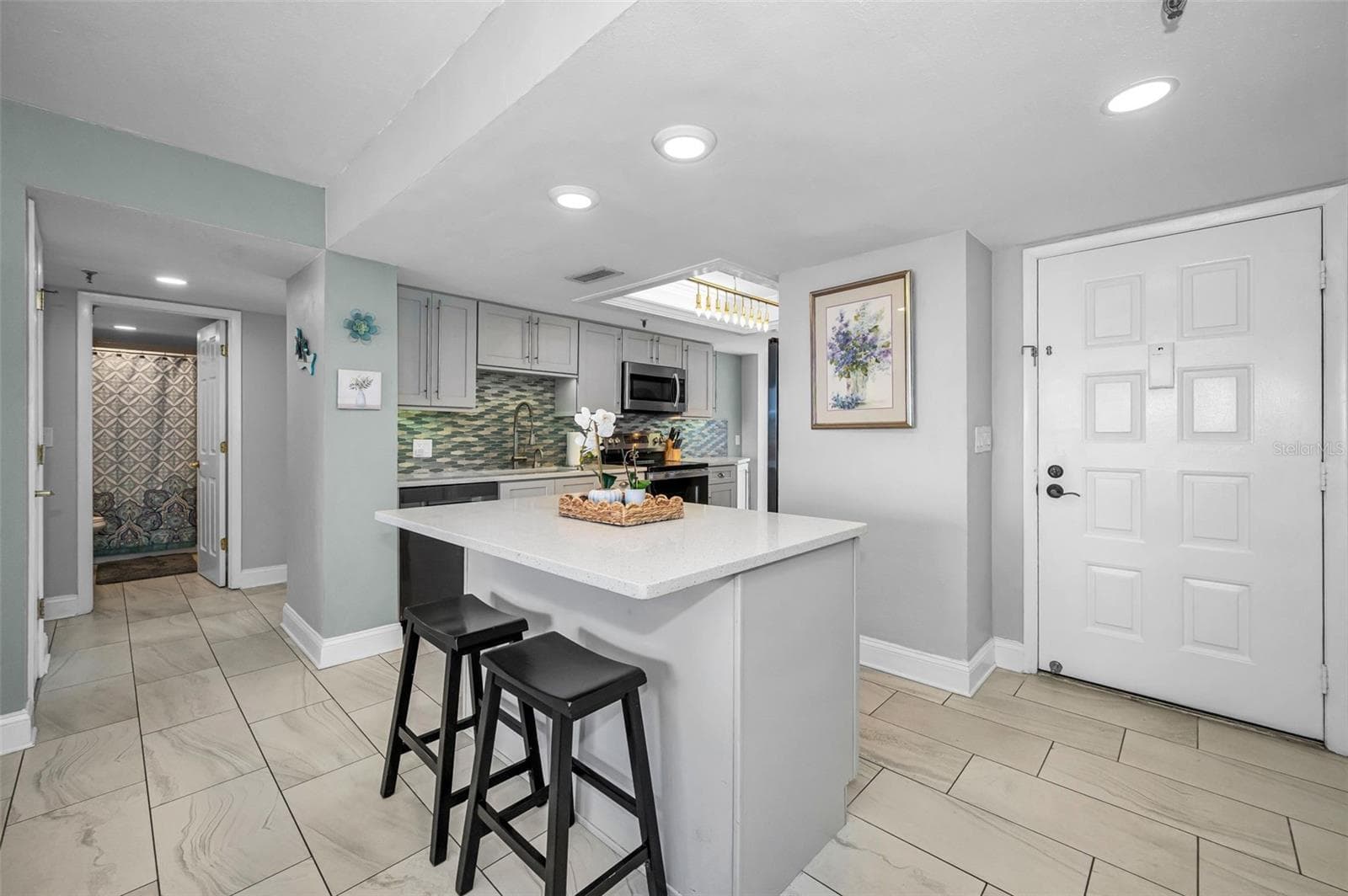 Contemporary Kitchen with Center Island and Buffet - 19111 VISTA BAY DR #304, INDIAN SHORES
