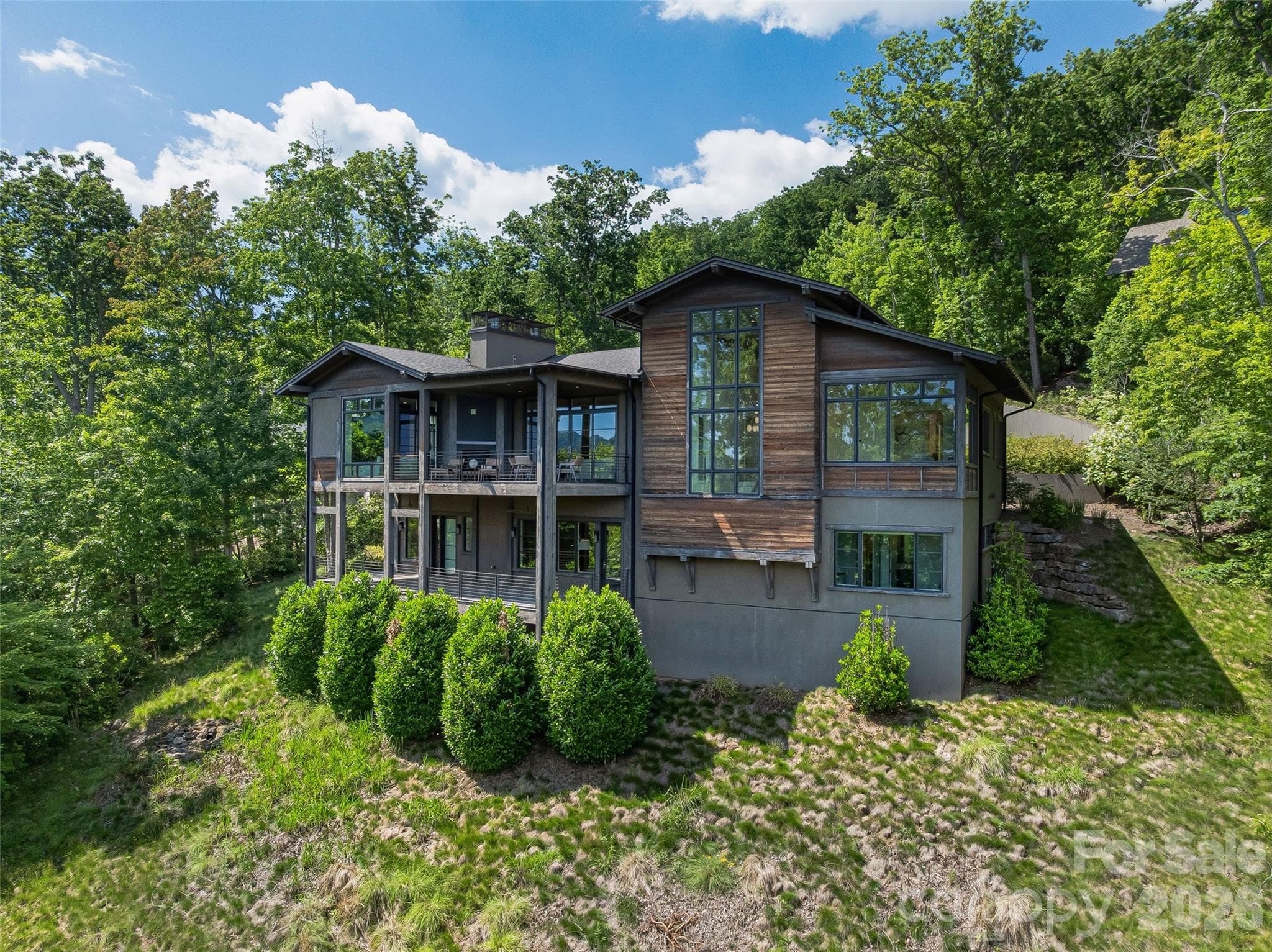 Architecturally distinctive mountain residence nestled into a private natural setting - Arden