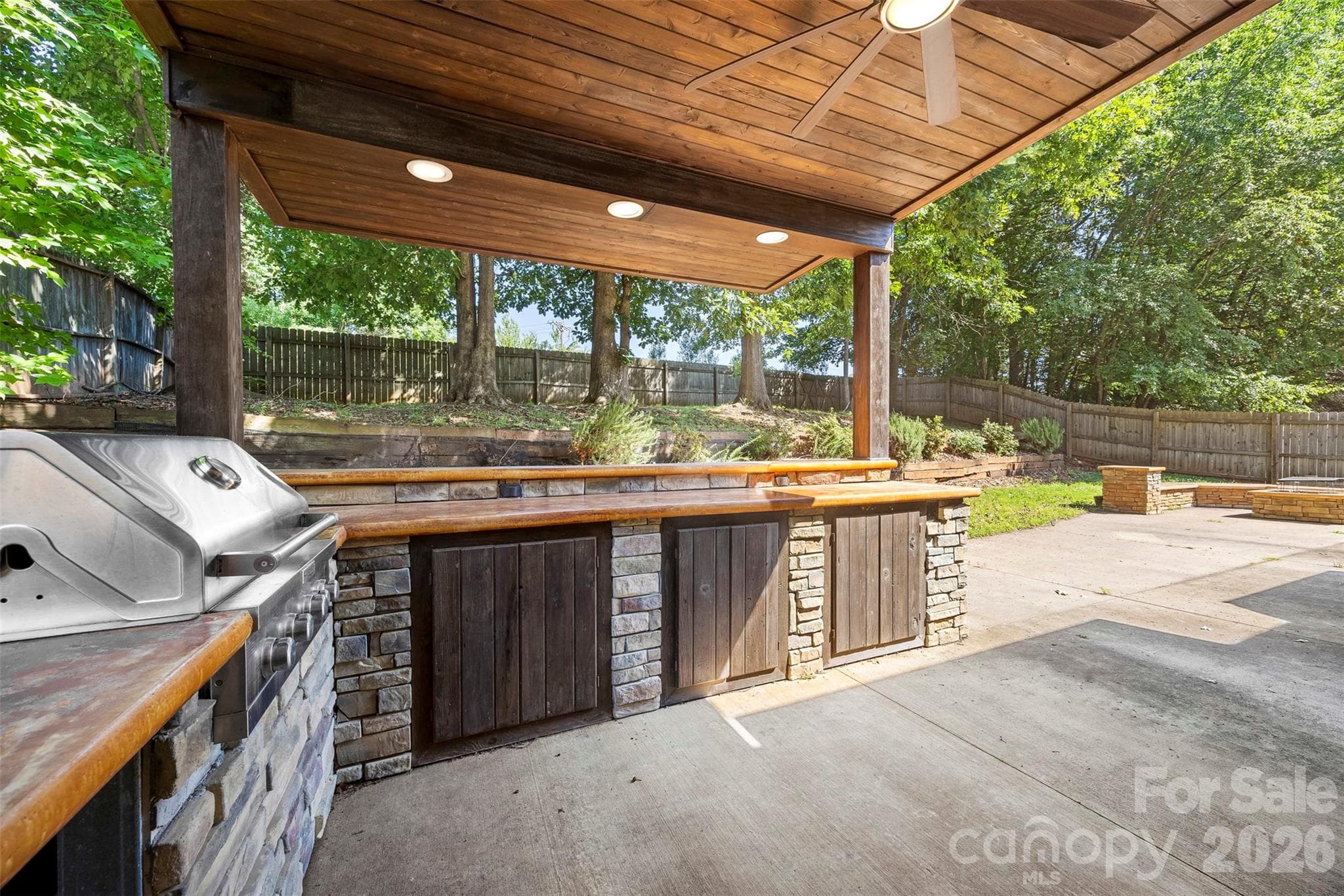Outdoor kitchen with built in gas grill - Huntersville