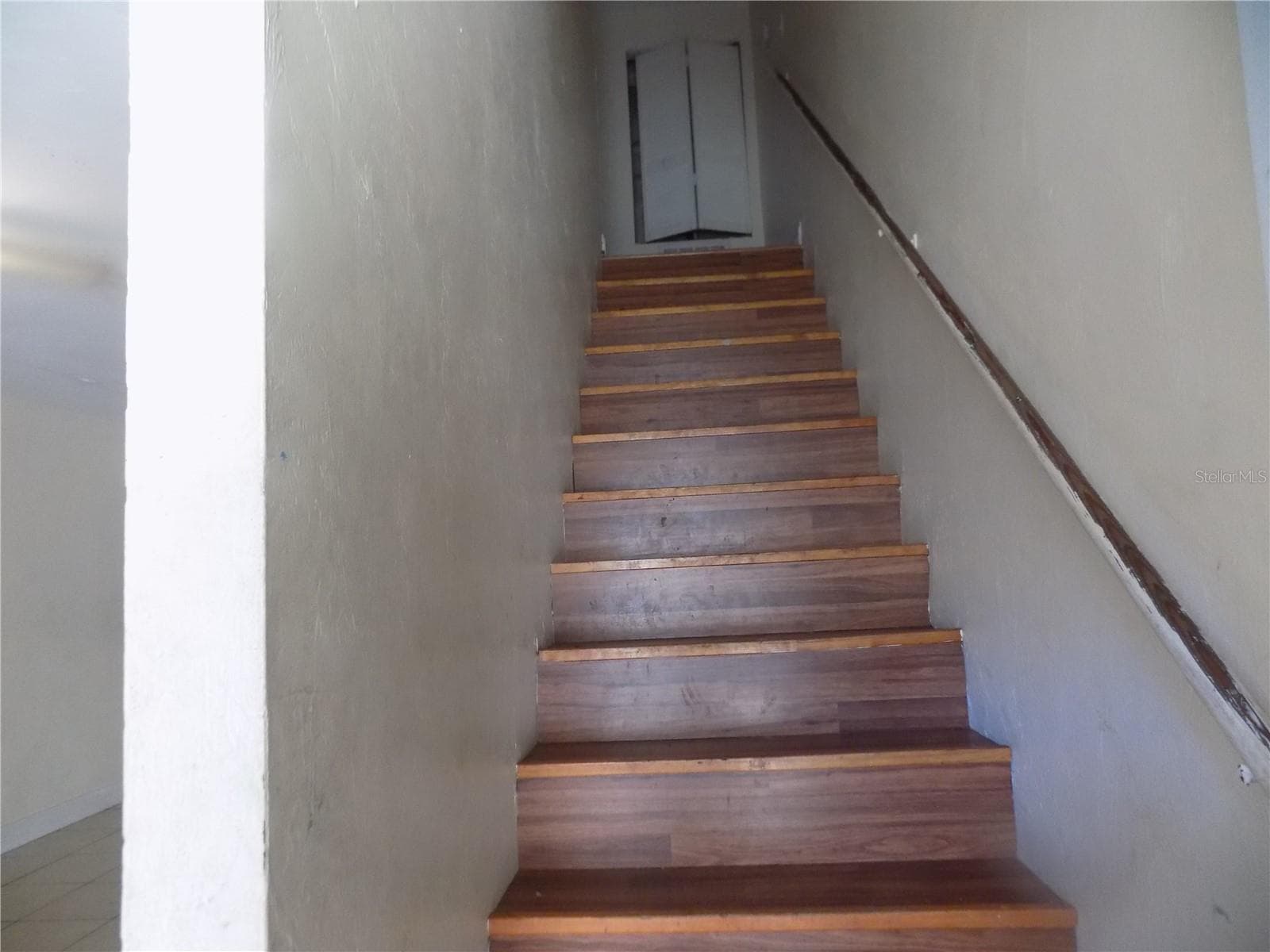 A stairs to bedrooms - 713 SW 69 ST, GAINESVILLE