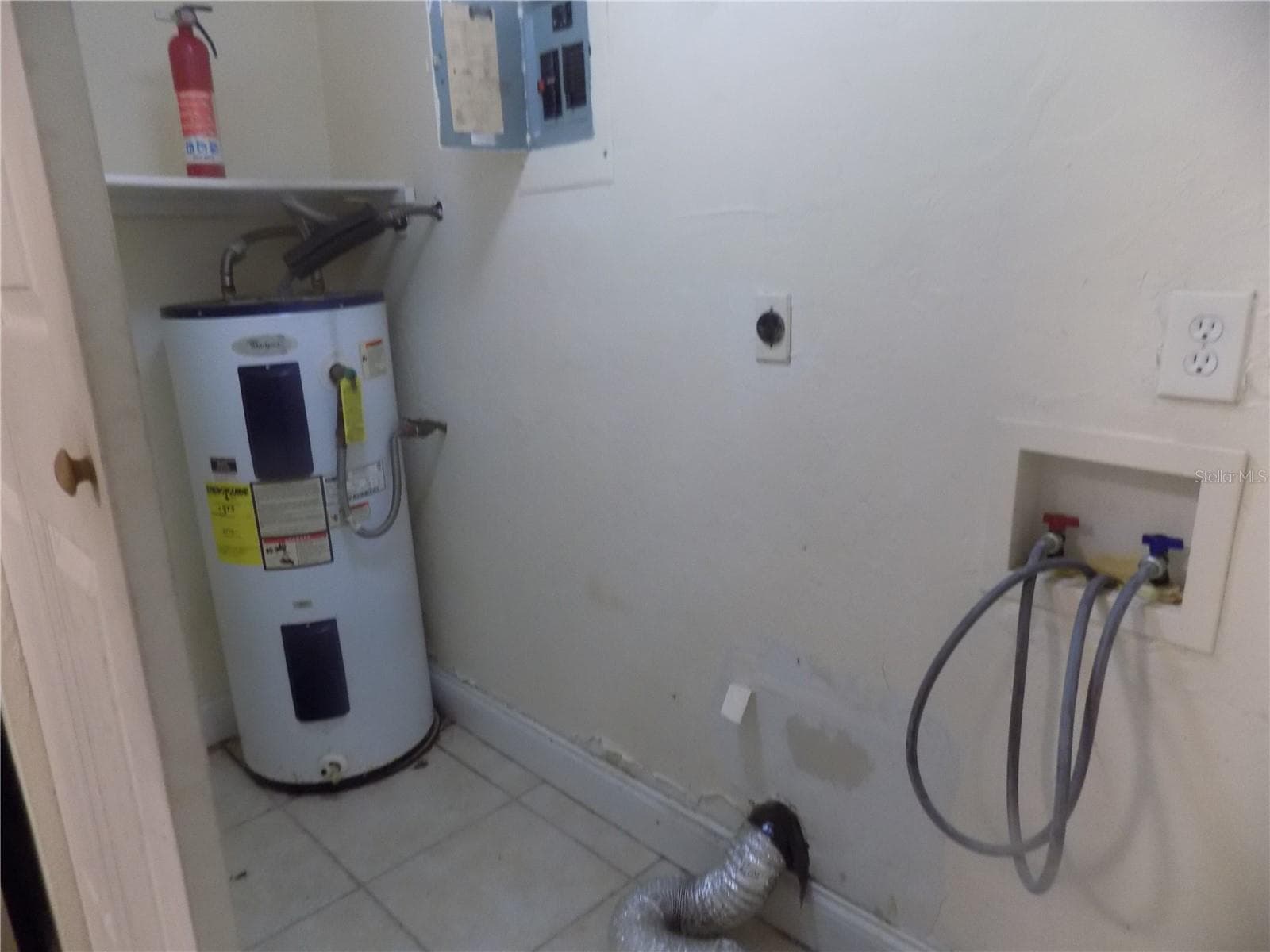 A water heater/washer/dryer hook ups - 713 SW 69 ST, GAINESVILLE