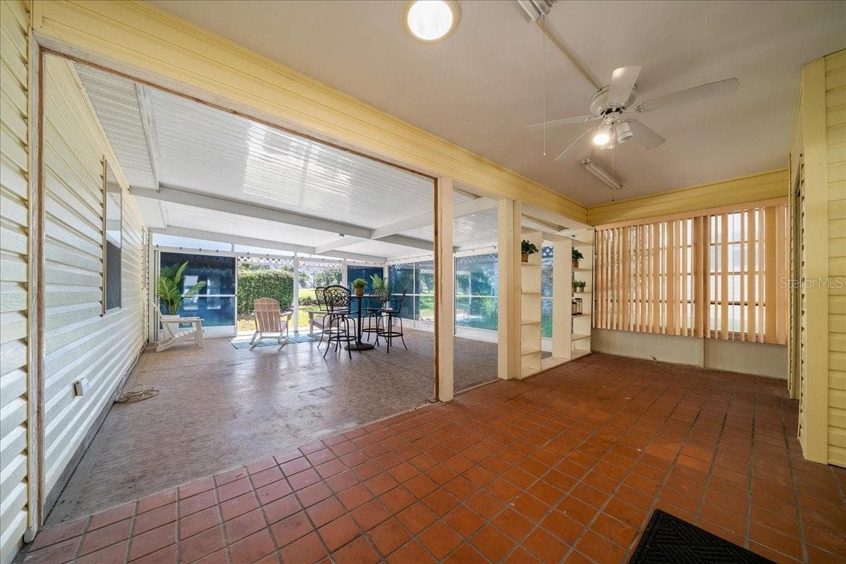 Carport Entrance View to Lanai - 1133 DEL TORO DR, LADY LAKE
