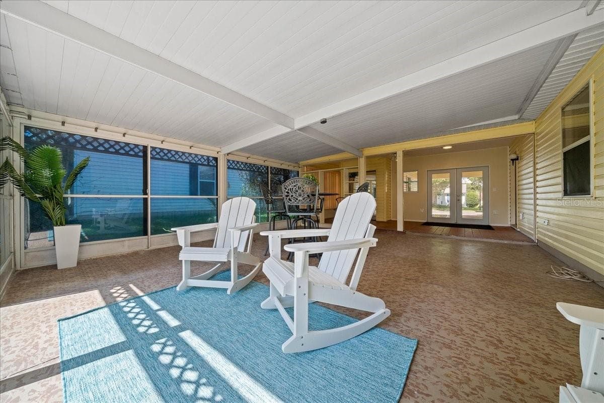 Lanai Front Row Seating to Watch the Golfers - 1133 DEL TORO DR, LADY LAKE