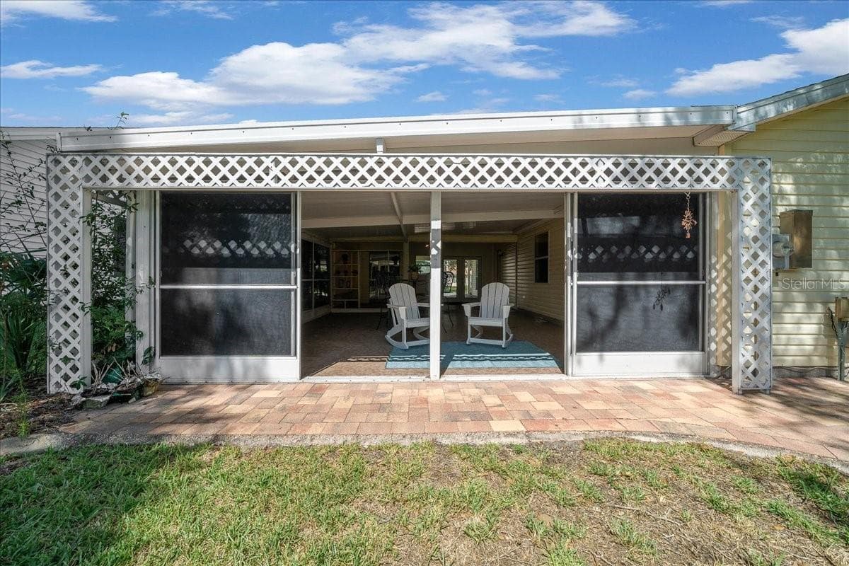 Rear View of Lanai - 1133 DEL TORO DR, LADY LAKE
