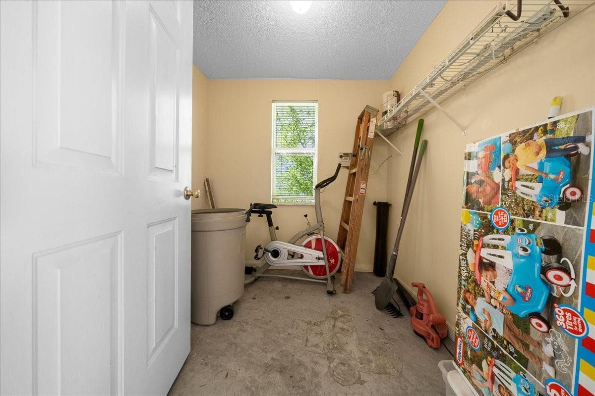 More Storage, Utility Sink inside - 1133 DEL TORO DR, LADY LAKE