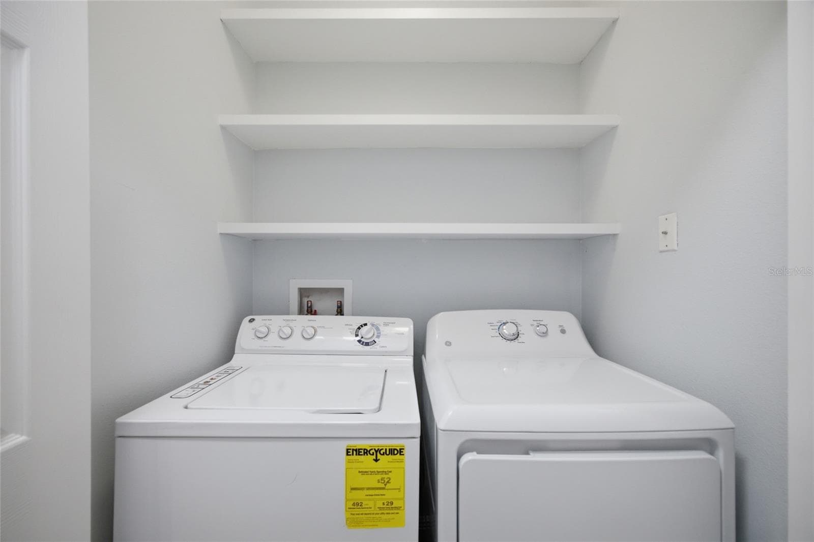 Laundry closet on 2nd floor - 485 HARBOR RIDGE DR, PALM HARBOR