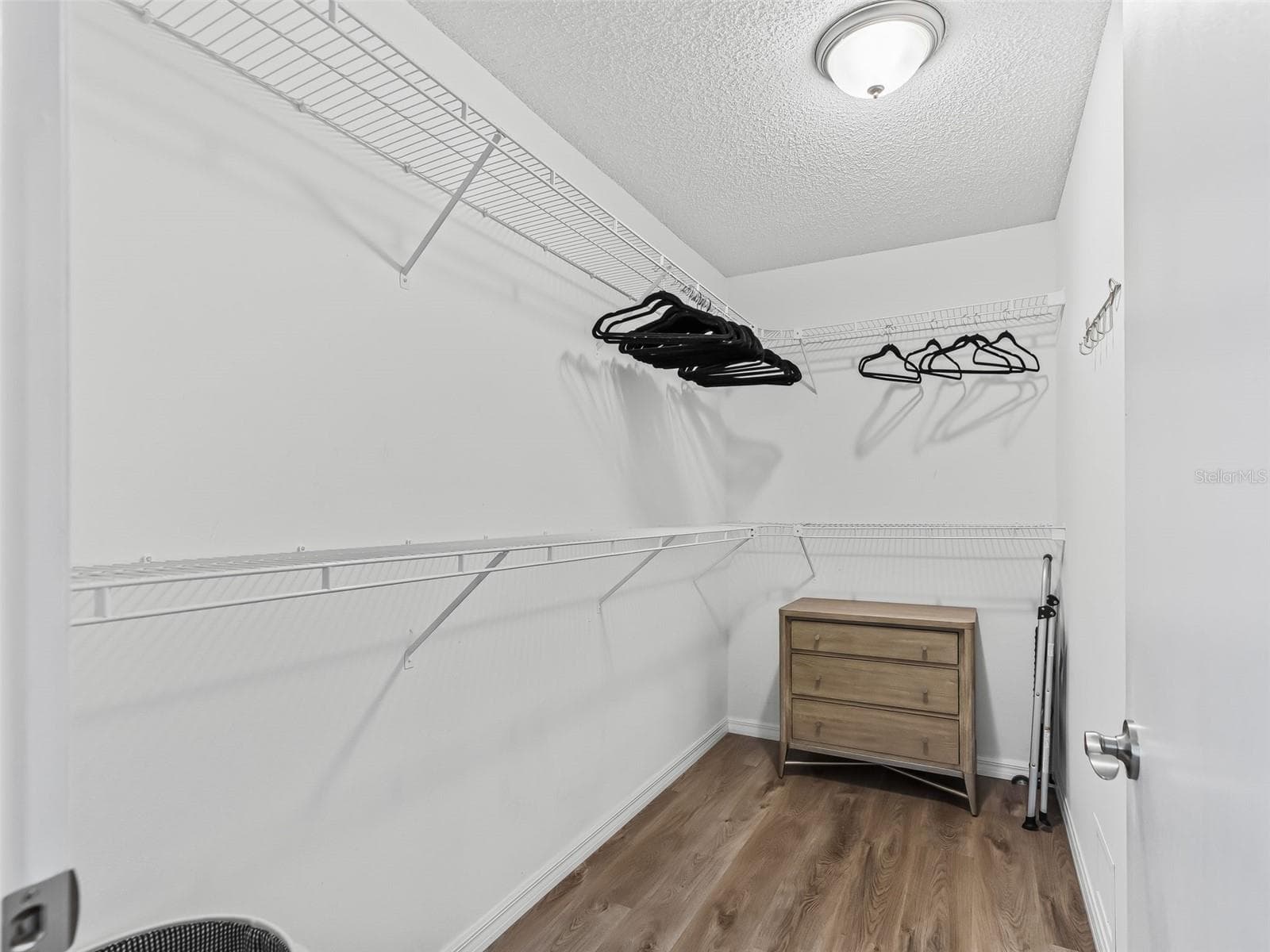 Primary Walk In Closet - 321 SAN MARINO DR, THE VILLAGES