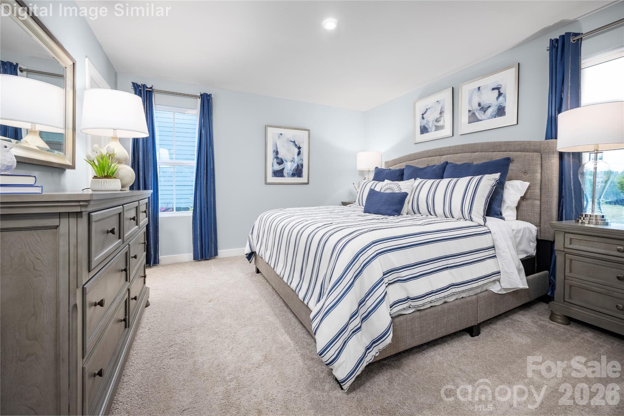 Framed by two wide windows, this serene retreat is bathed in natural light, creating a warm and peaceful ambiance from sunrise to sunset. - 208 Linwood Estates Drive, Lexington