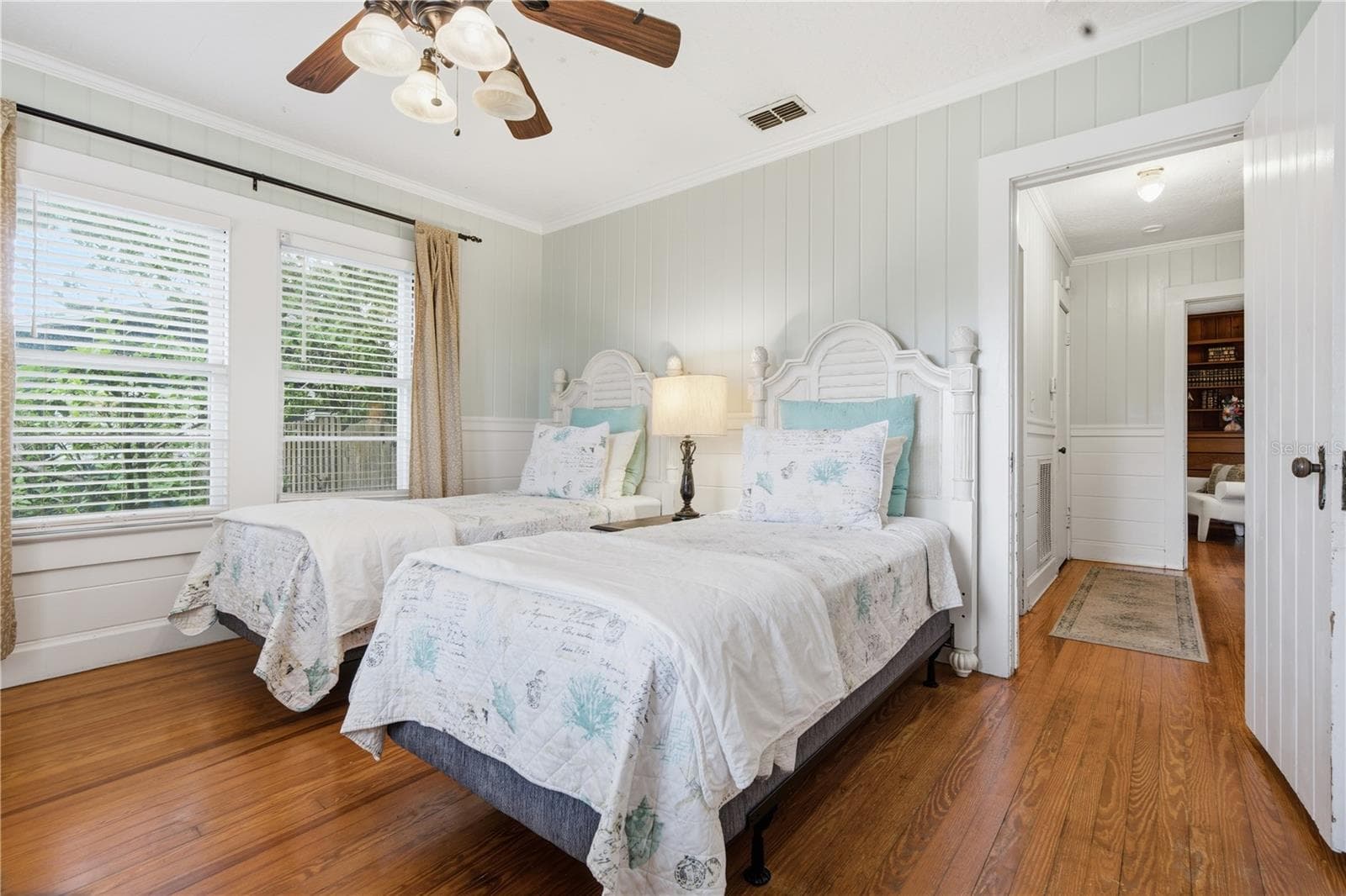 Guest bedroom with fresh finishes and flexible layout options. - 411 W 48TH ST, BRADENTON