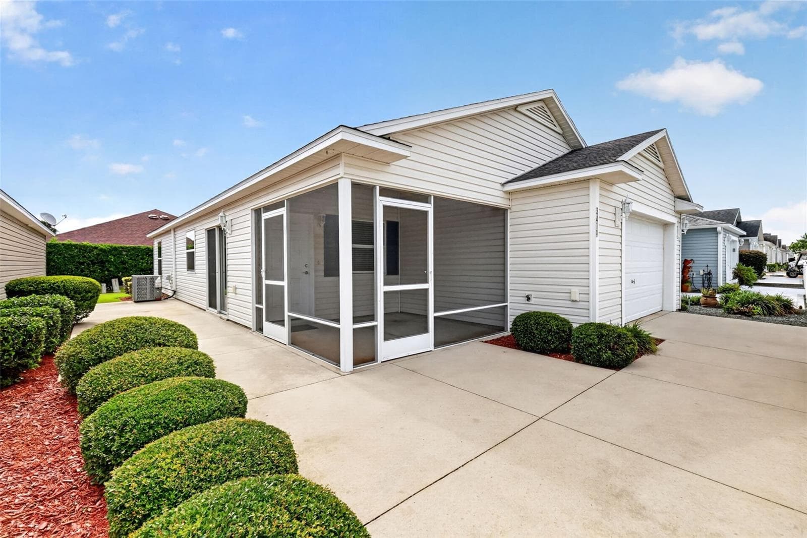 Front Elevation with Lanai and Spacious Rear and Side Patios - 3419 CARRABELLE CT, THE VILLAGES