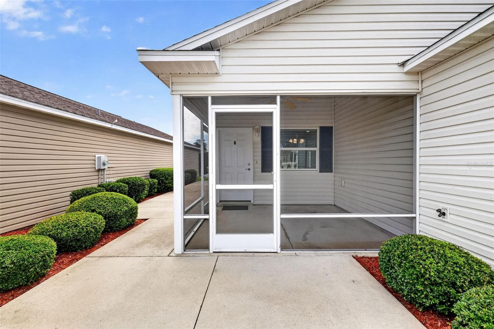 Front Elevation with Lanai and Spacious Rear and Side Patios - 3419 CARRABELLE CT, THE VILLAGES