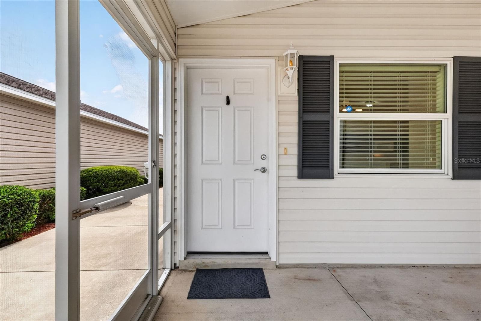 Lanai and Front Entry - 3419 CARRABELLE CT, THE VILLAGES