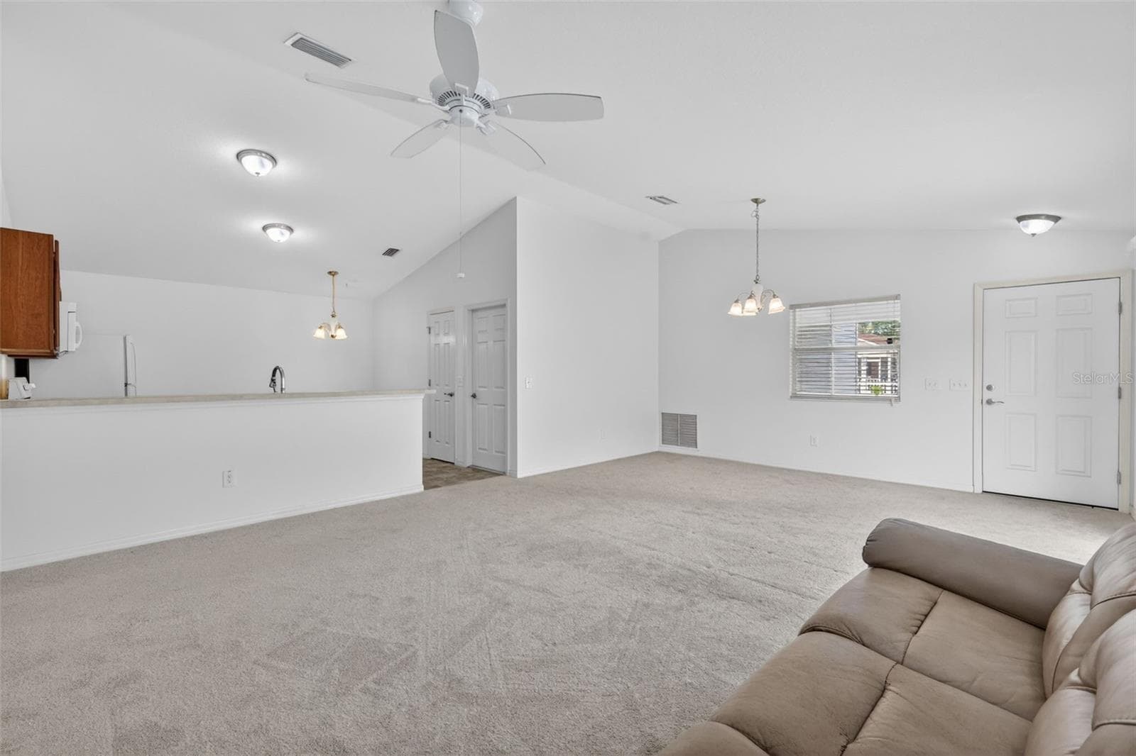 Living, Dining, and Kitchen - 3419 CARRABELLE CT, THE VILLAGES