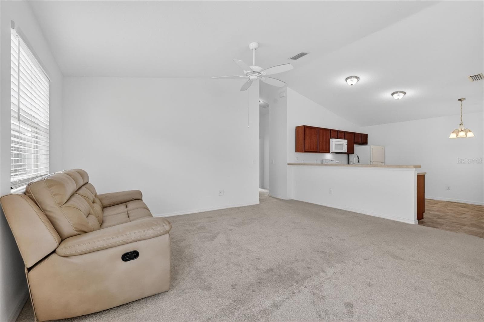Living Room and Kitchen - 3419 CARRABELLE CT, THE VILLAGES