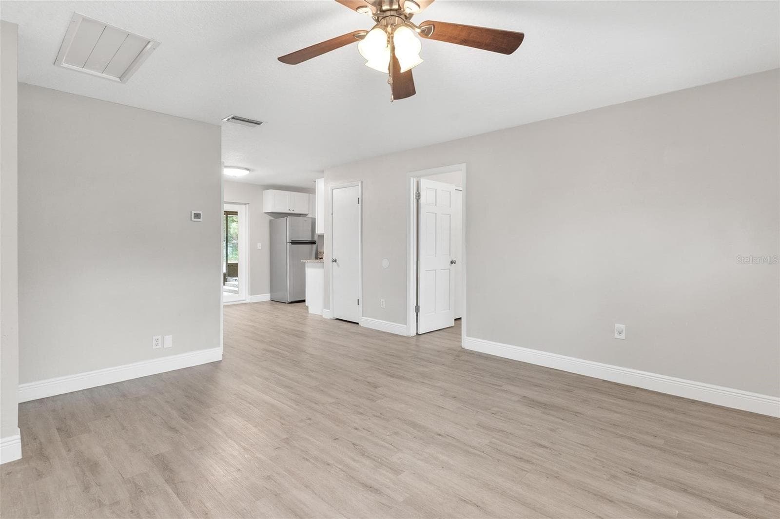 Living Room with Luxury Vinyl Wood Flooring! - 35904 DAWN DR, LEESBURG