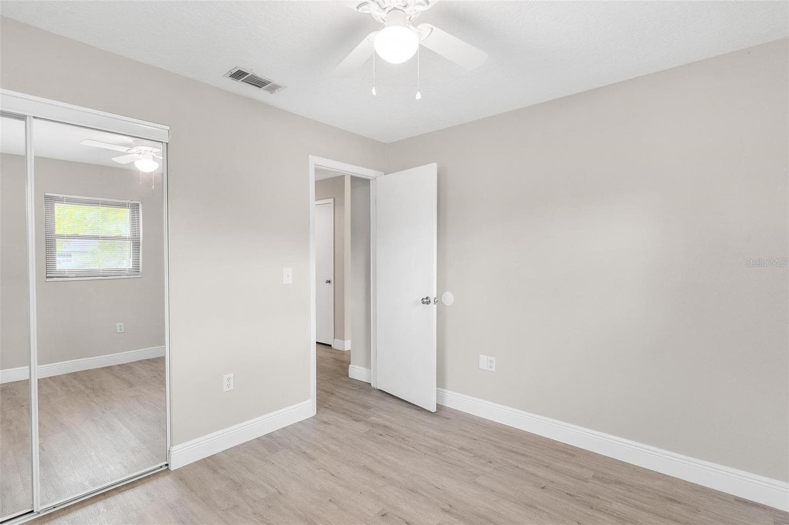 Bedroom 3 with large wall closet & Decorative Mirrored Door - 35904 DAWN DR, LEESBURG